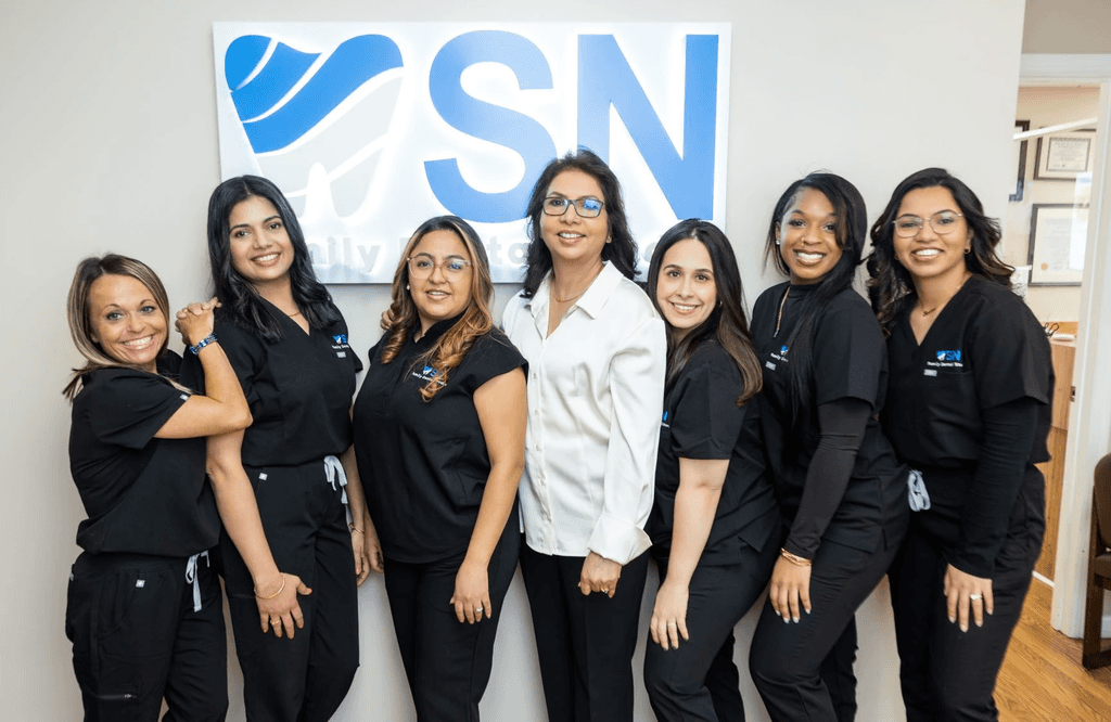 Dentist team smiling in dental office Milltown NJ