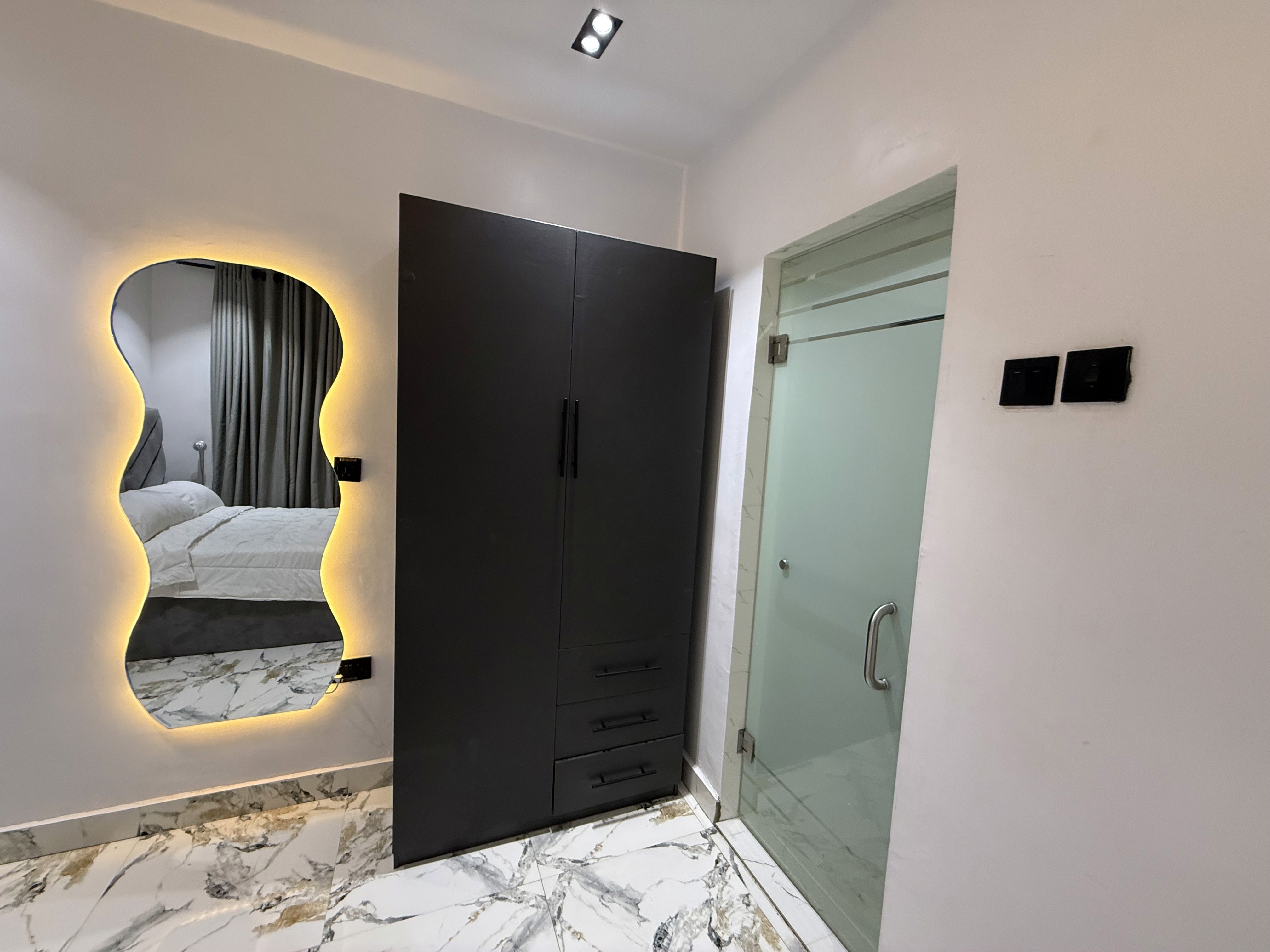 Tastefully designed entry area at Olive The Crest, modern shortlet apartment in Yaba, Lagos