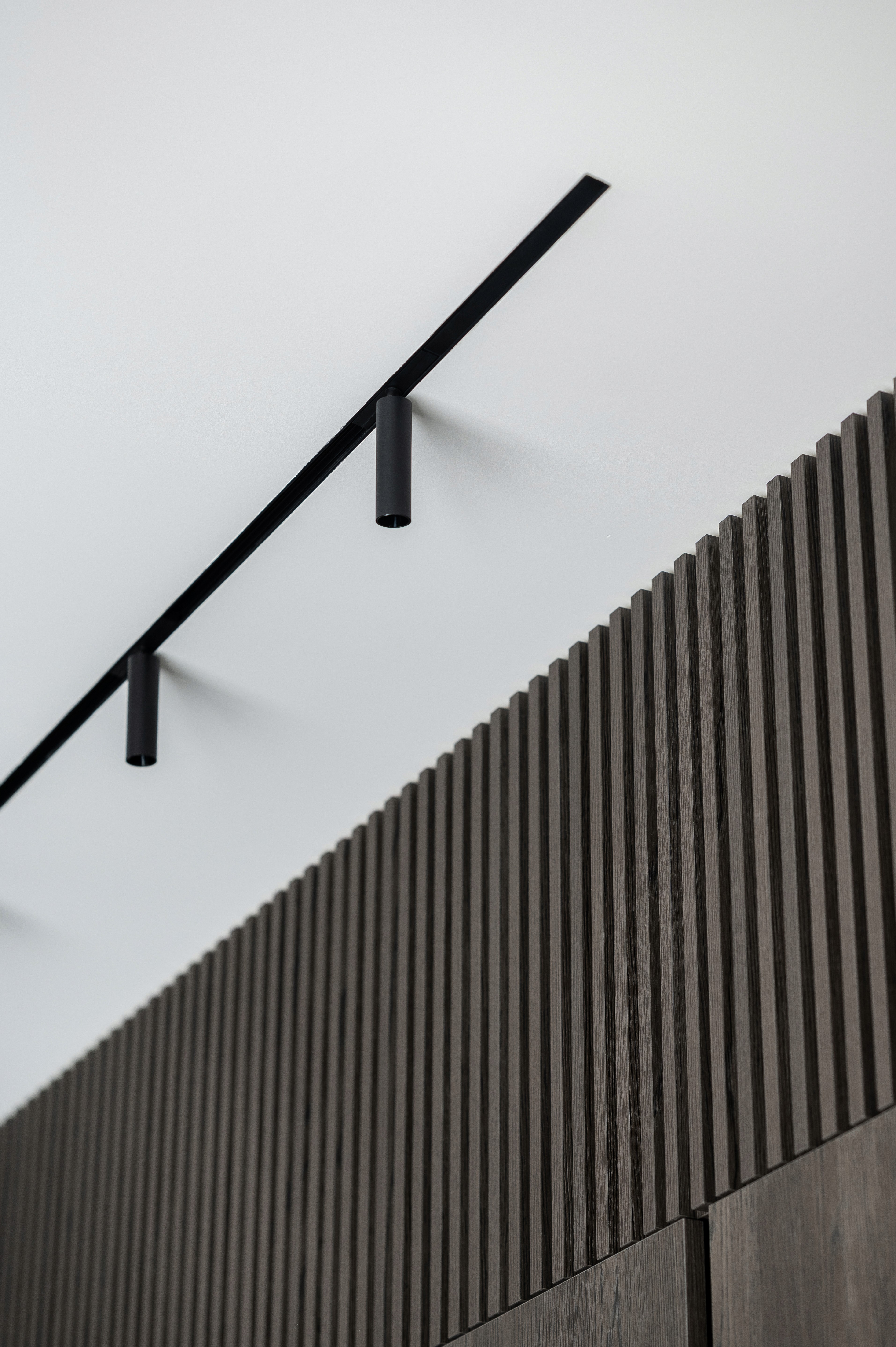 a woman in a dress sitting on a couch