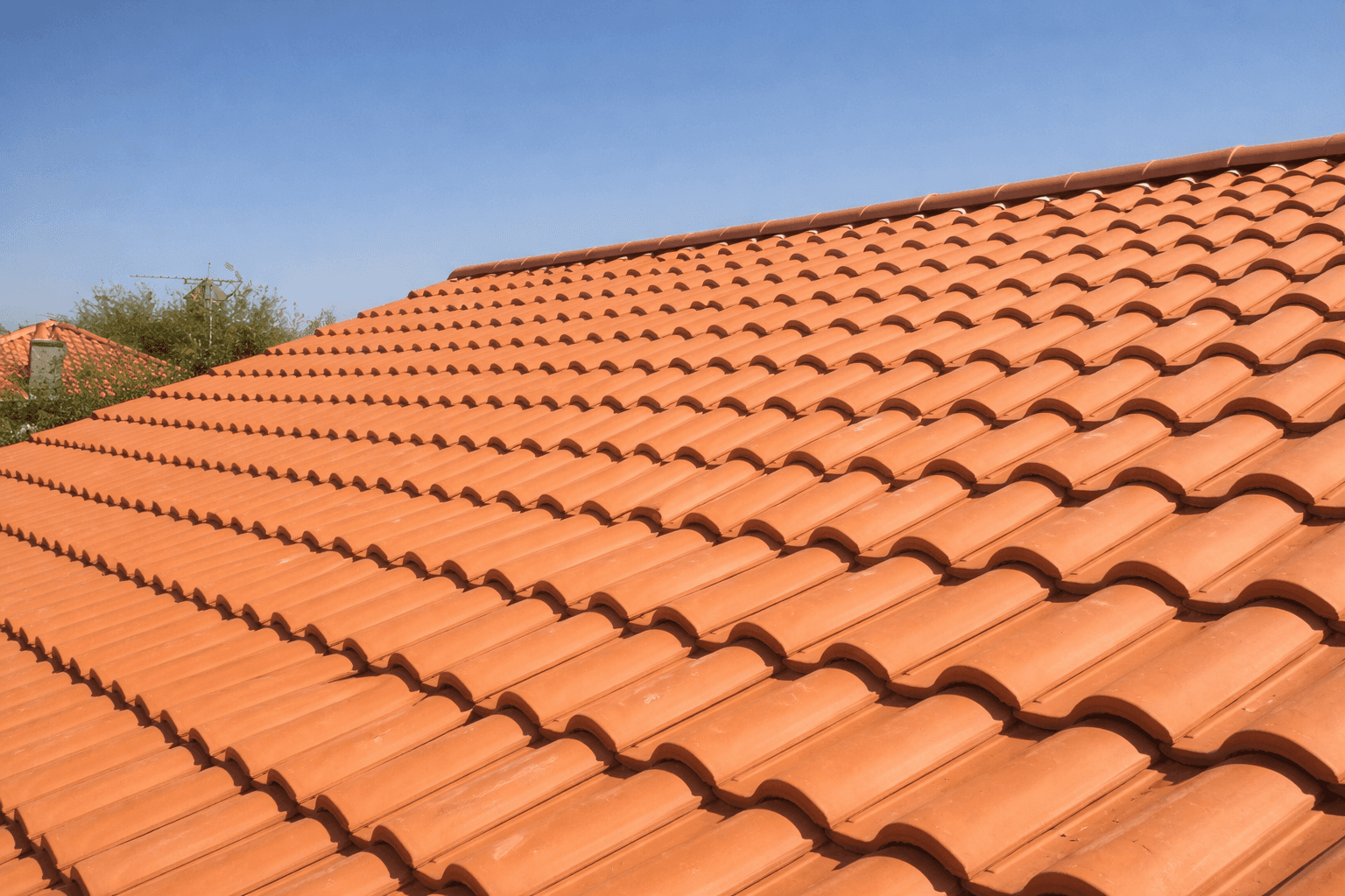 black leather padded armchair near black wooden framed glass window