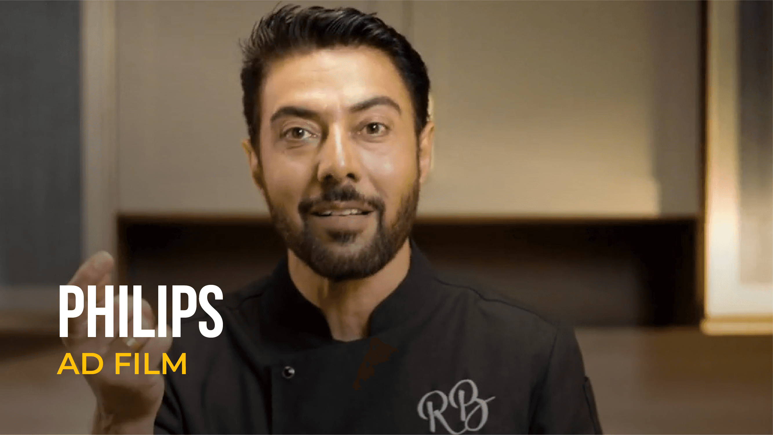 Ranveer Brar featured in Philips ad film wearing black chef attire.