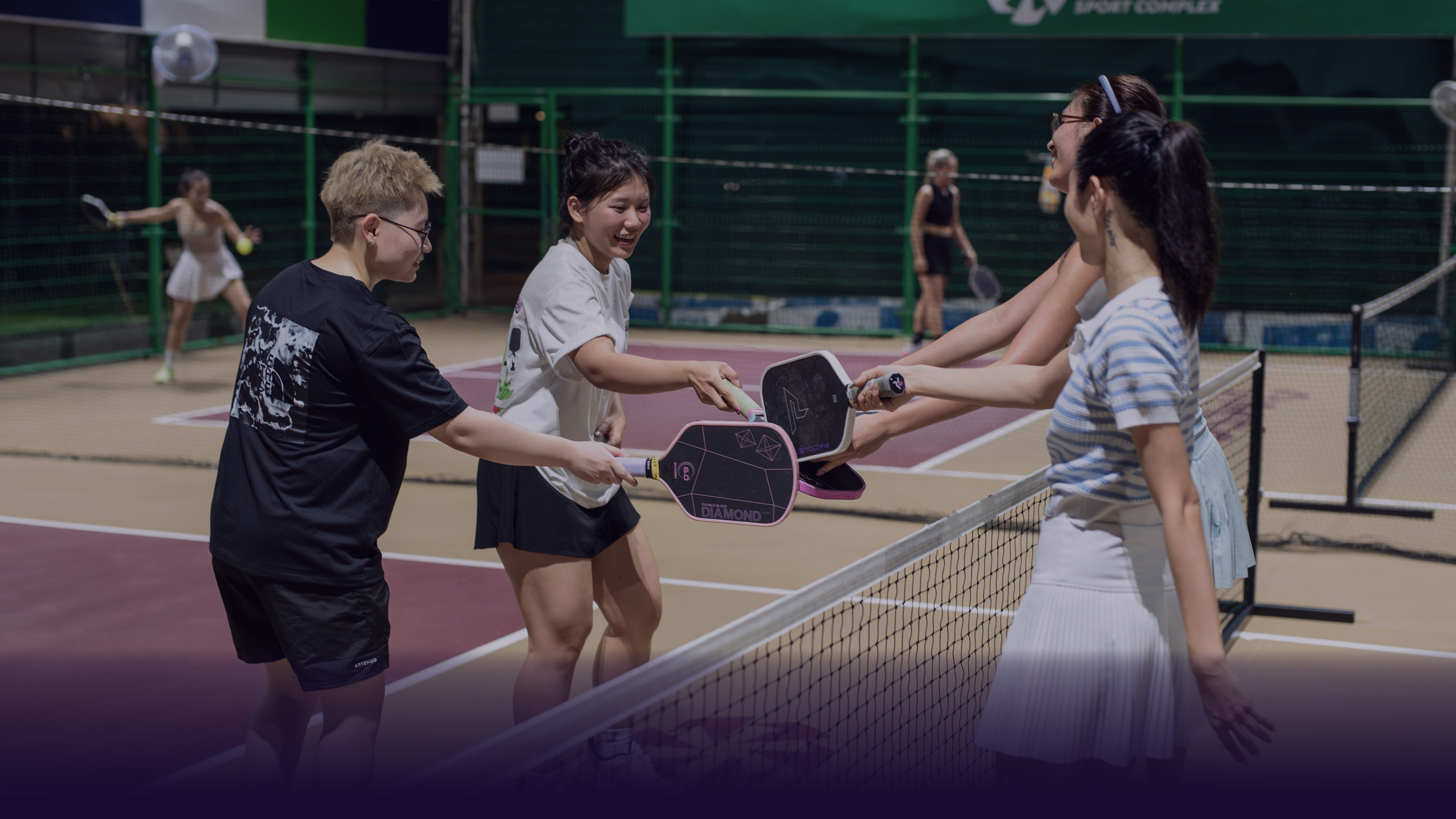 A lady with surfboard