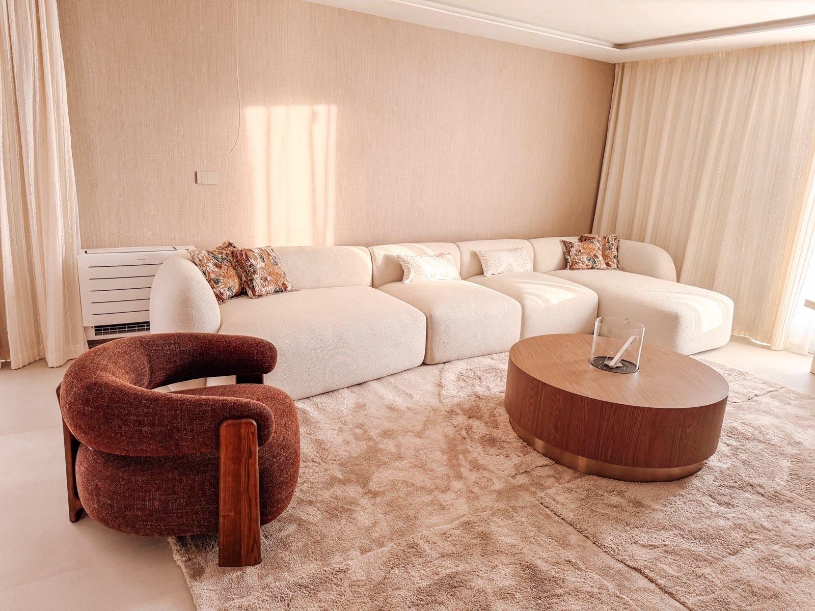 Bedroom with wall bookshelf and mountain view.