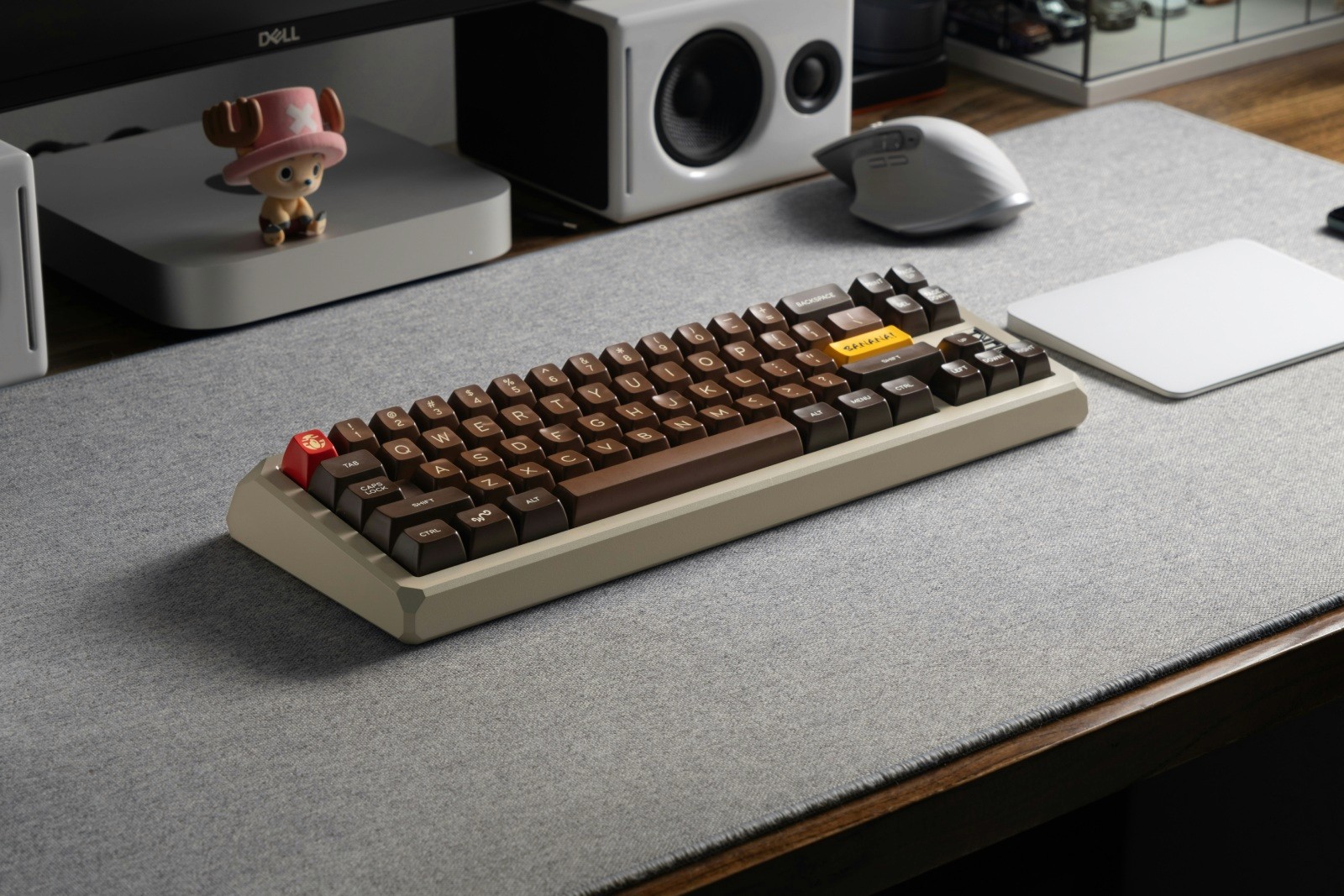A computer keyboard sitting on top of a desk