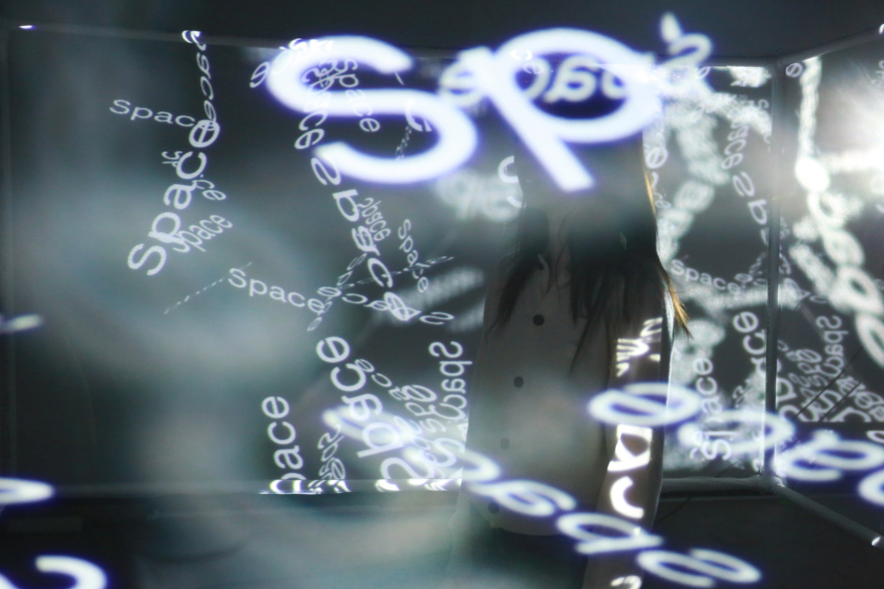 Streetside billboard with flyposters of the Batch.Works brand and illustrations