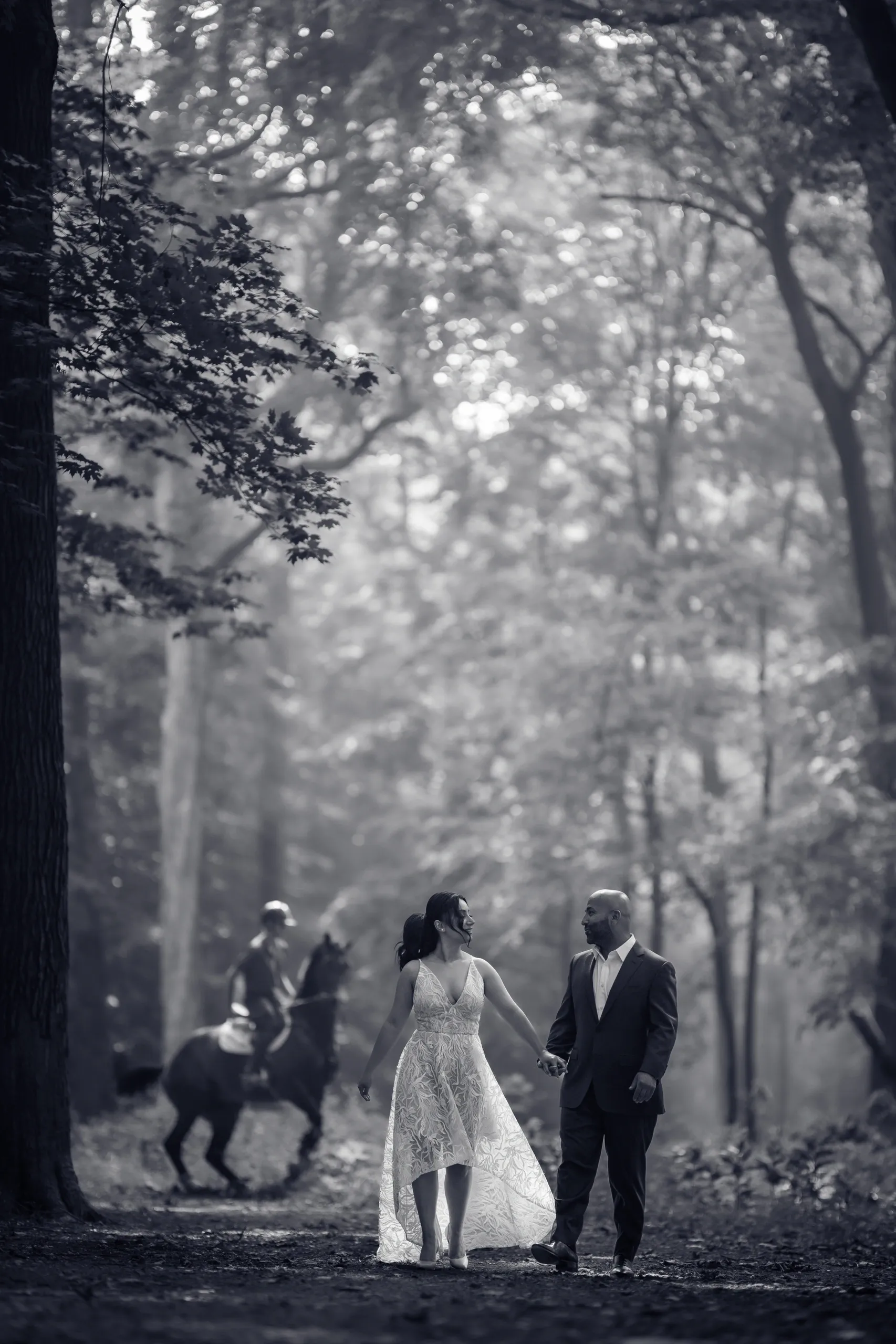 a woman holding a red flower