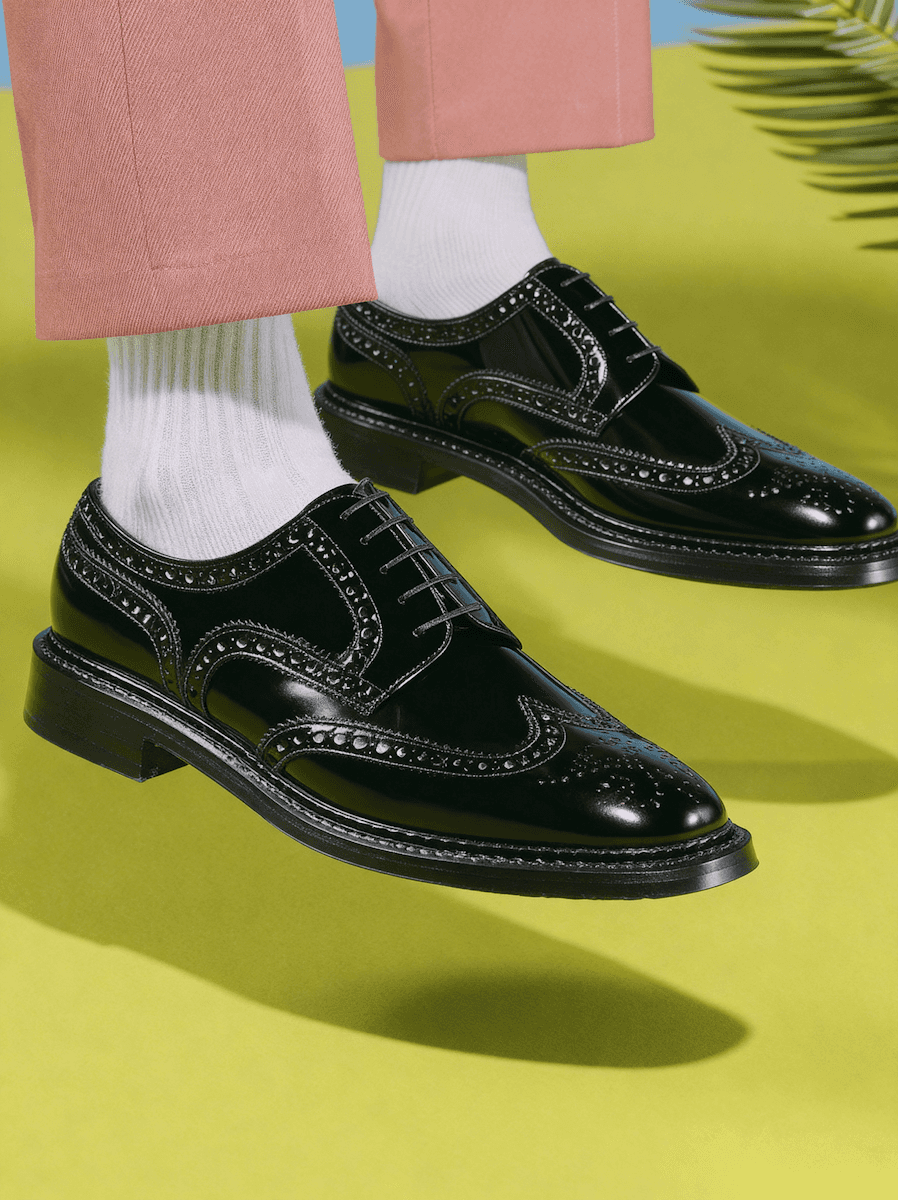 man wearing a black shoe