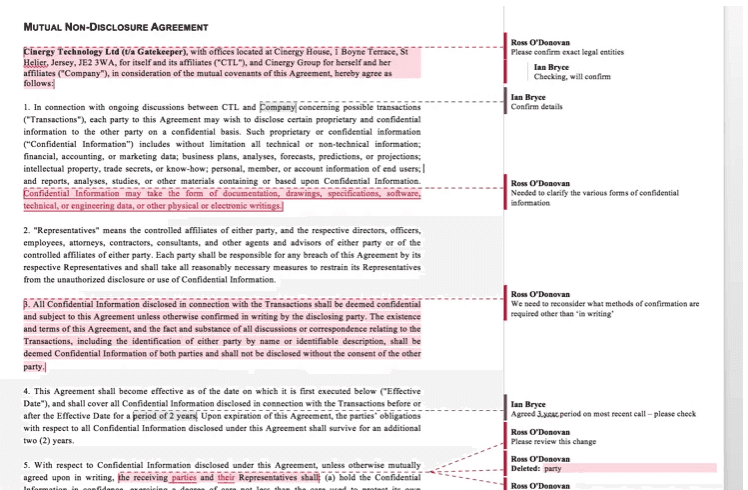 A detailed image of a contract with multiple redlines and edits, highlighting revisions and updates in progress.