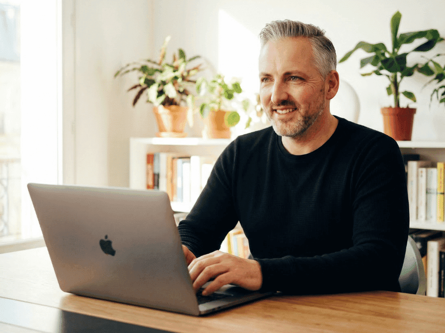 Woman Focused on Working Laptop