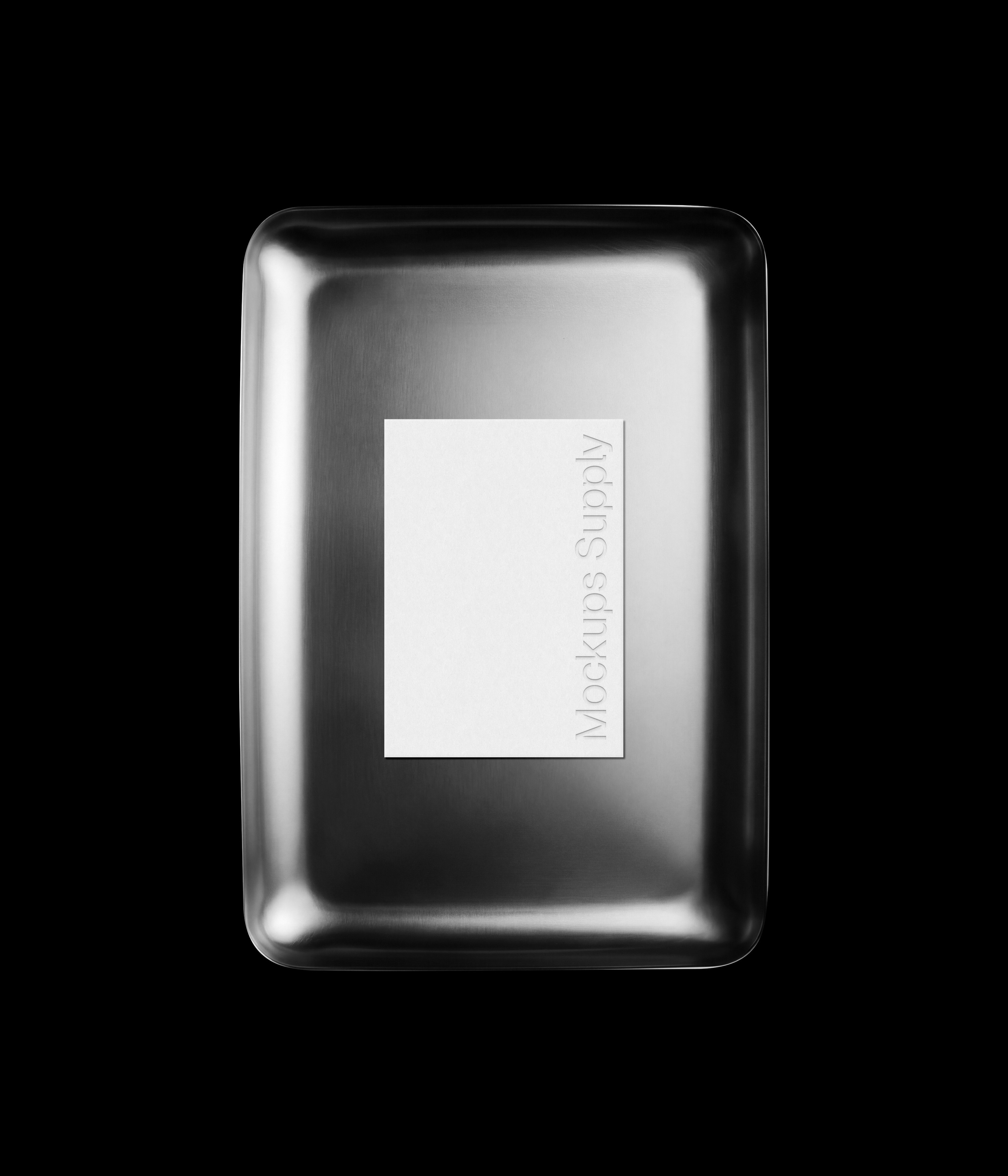 Flyer mockup on minimal metal plate with debossed text effect for branding and stationery presentation