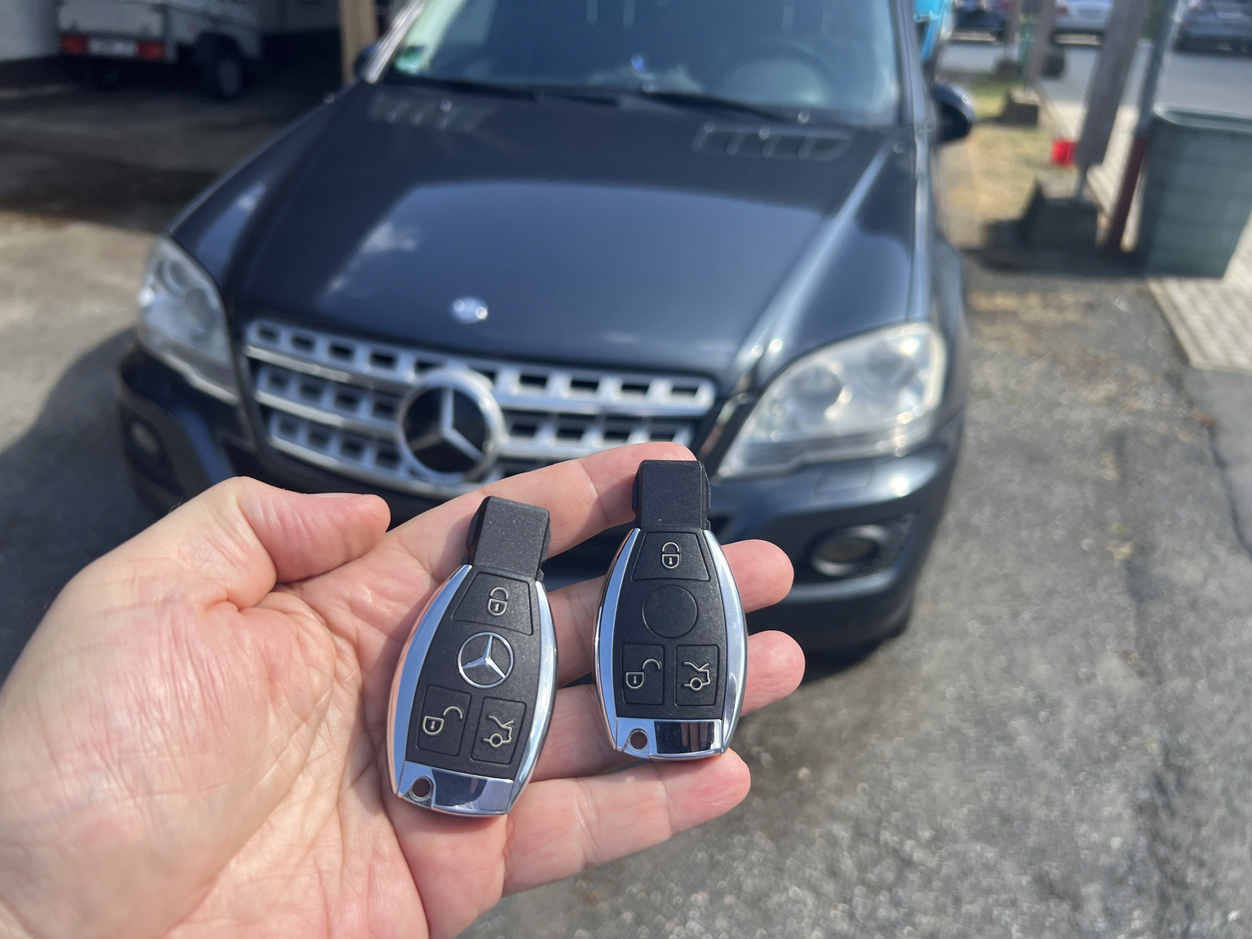 a person swimming in the water with grass