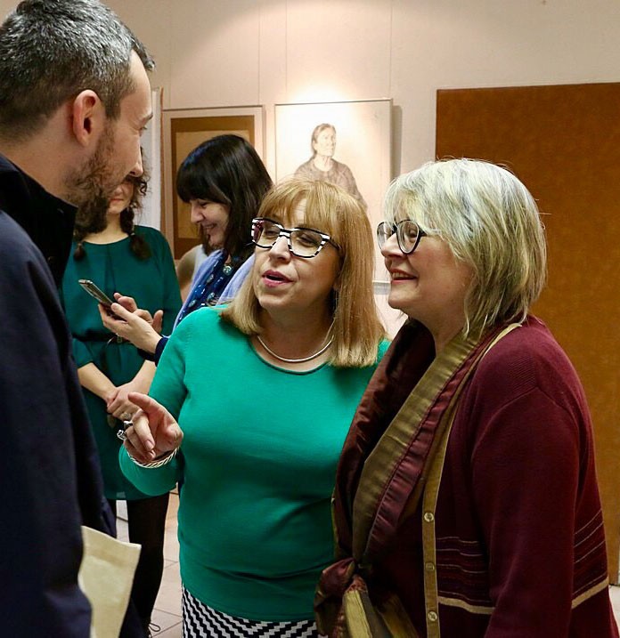 The head of the Institute speaking to some of the audience
