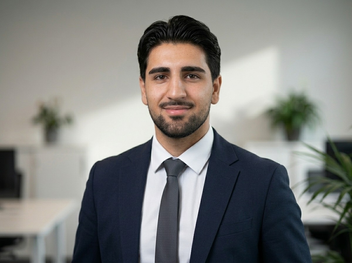 Laptop displaying website on wooden table