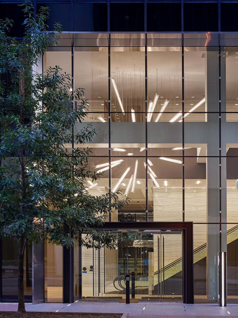Shard lighting installation – suspended acrylic shards illuminated by internal LEDs in the atrium of Charlotte Plaza