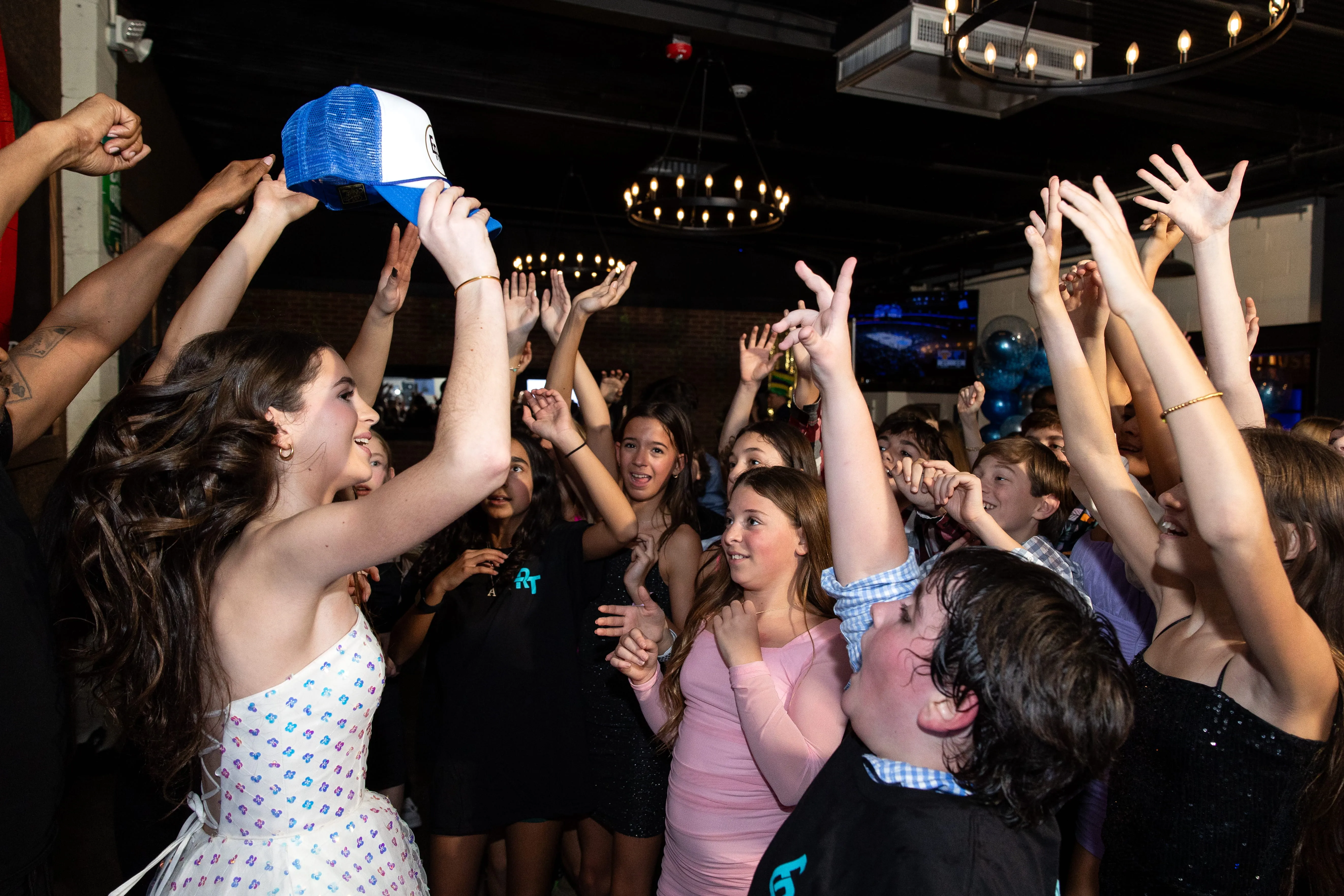 Kids playing interactive games on Bat Mitzvah dance floor with DJ entertainment