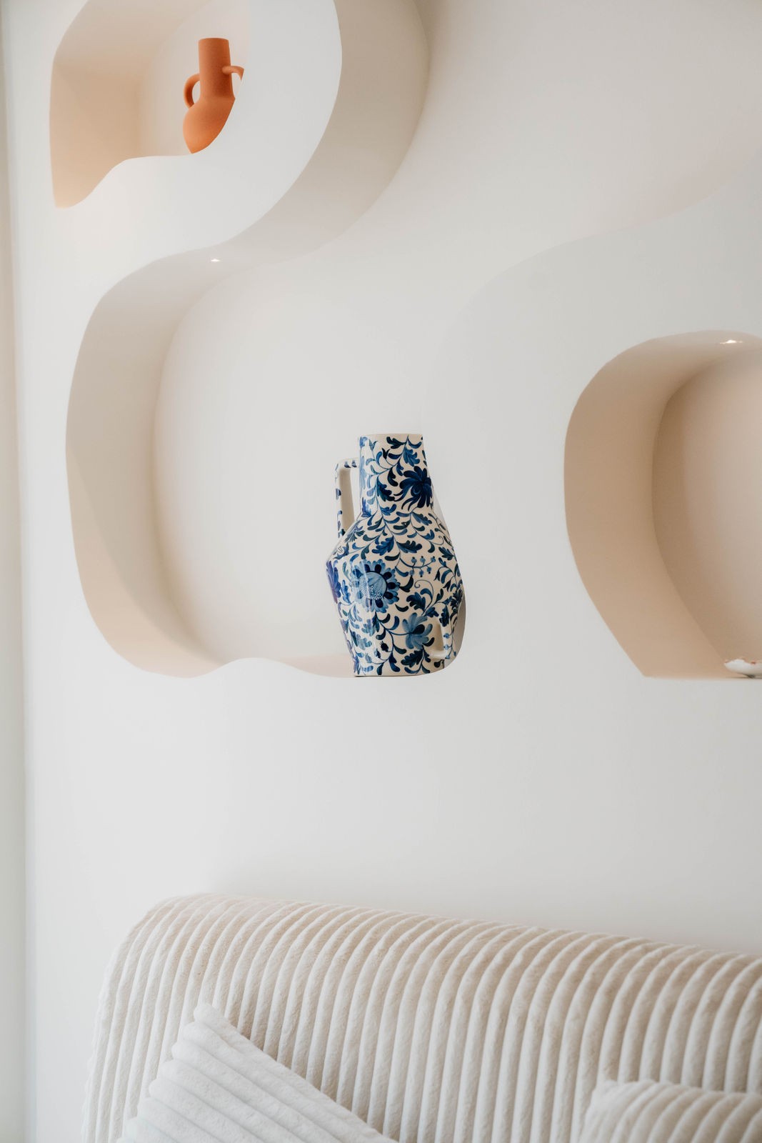 lake landscape with clear blue water, forest and mountains at the backdrop