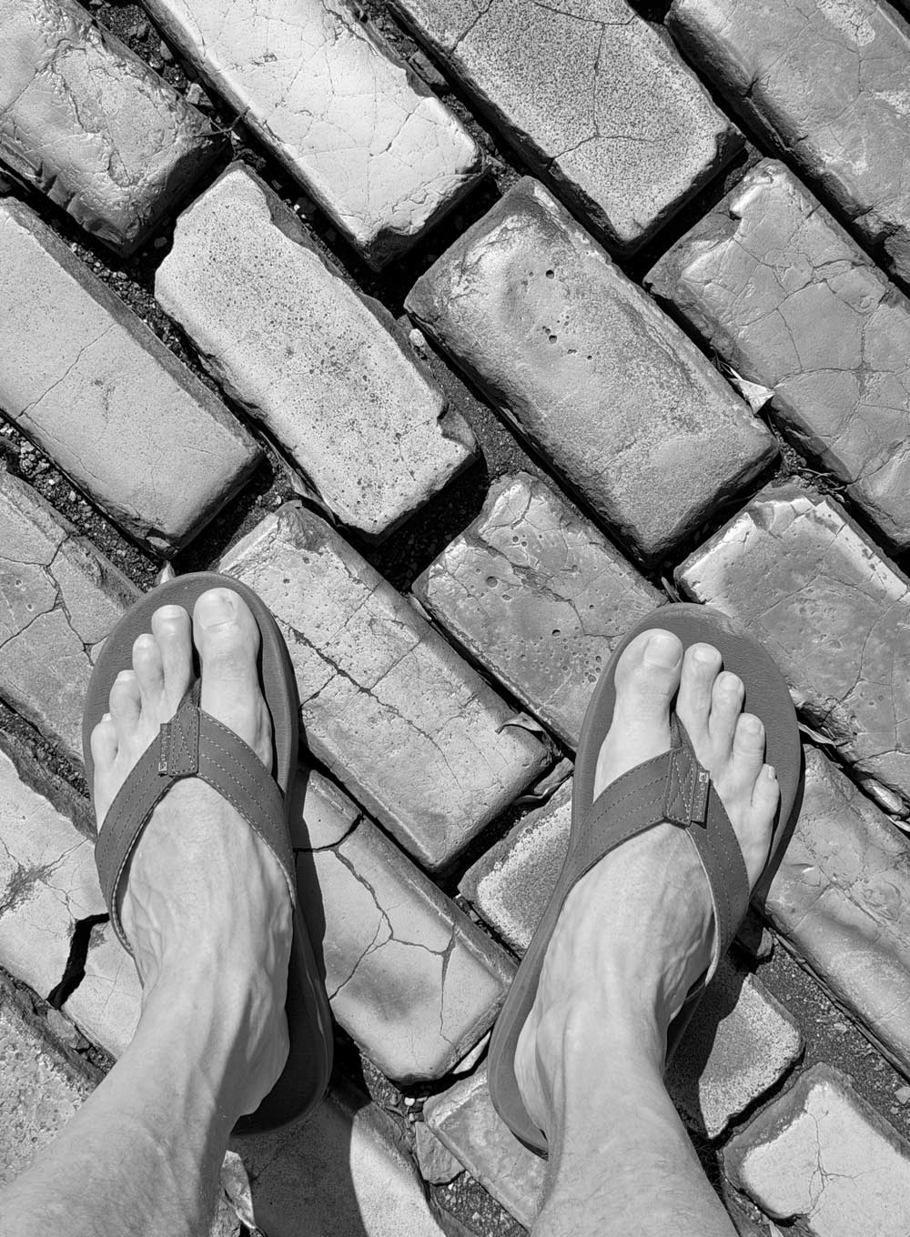a blurry photo of a person standing in front of a wall