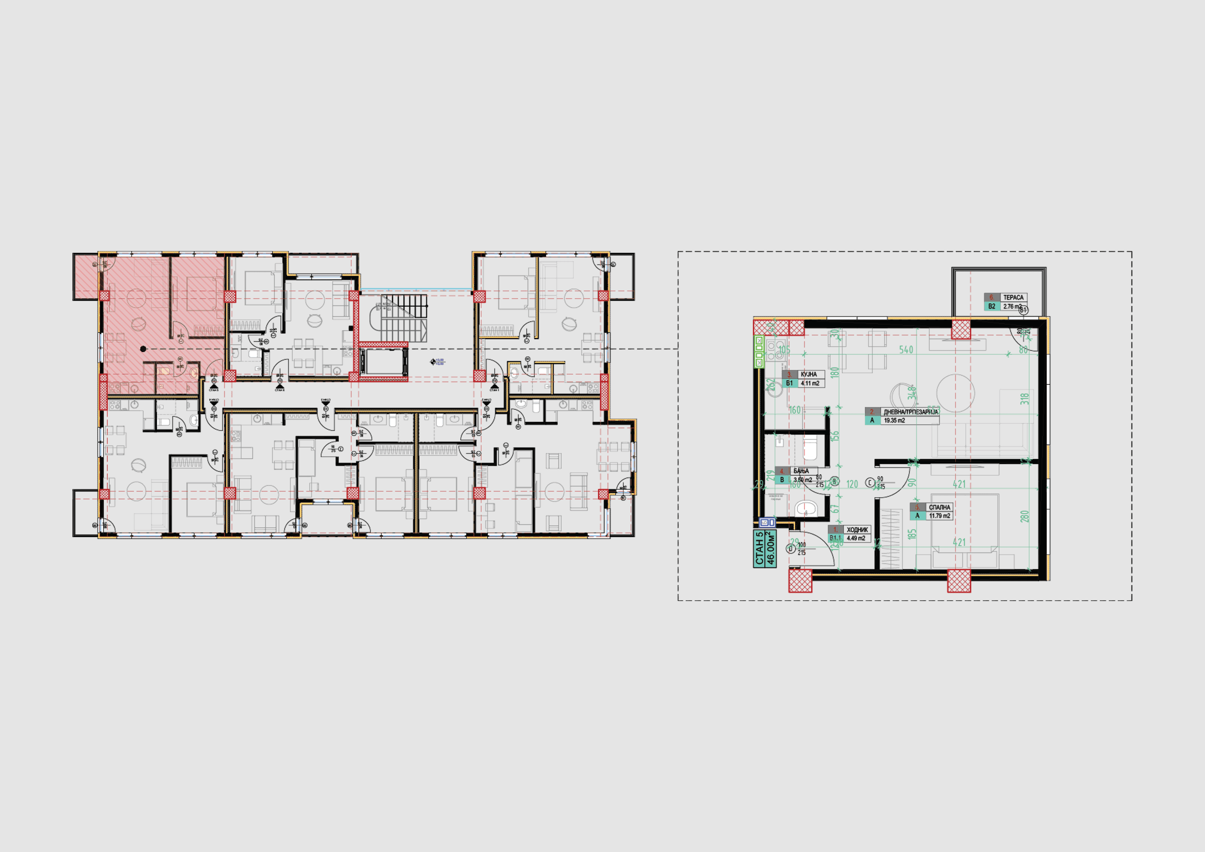 a corner of a room with a chair and paintings