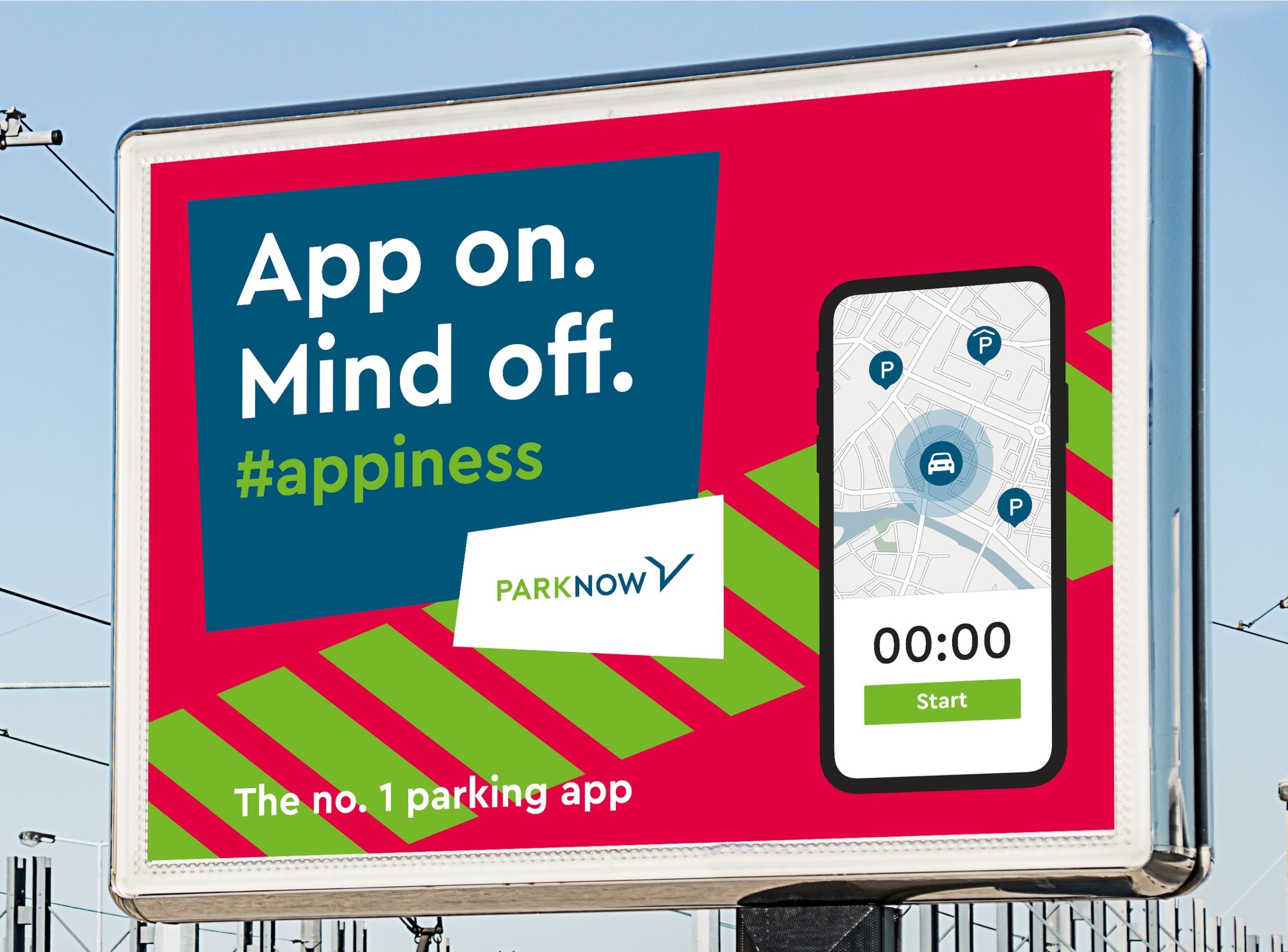 Billboard with PARK NOW campaign sign app brand touchpoint asset