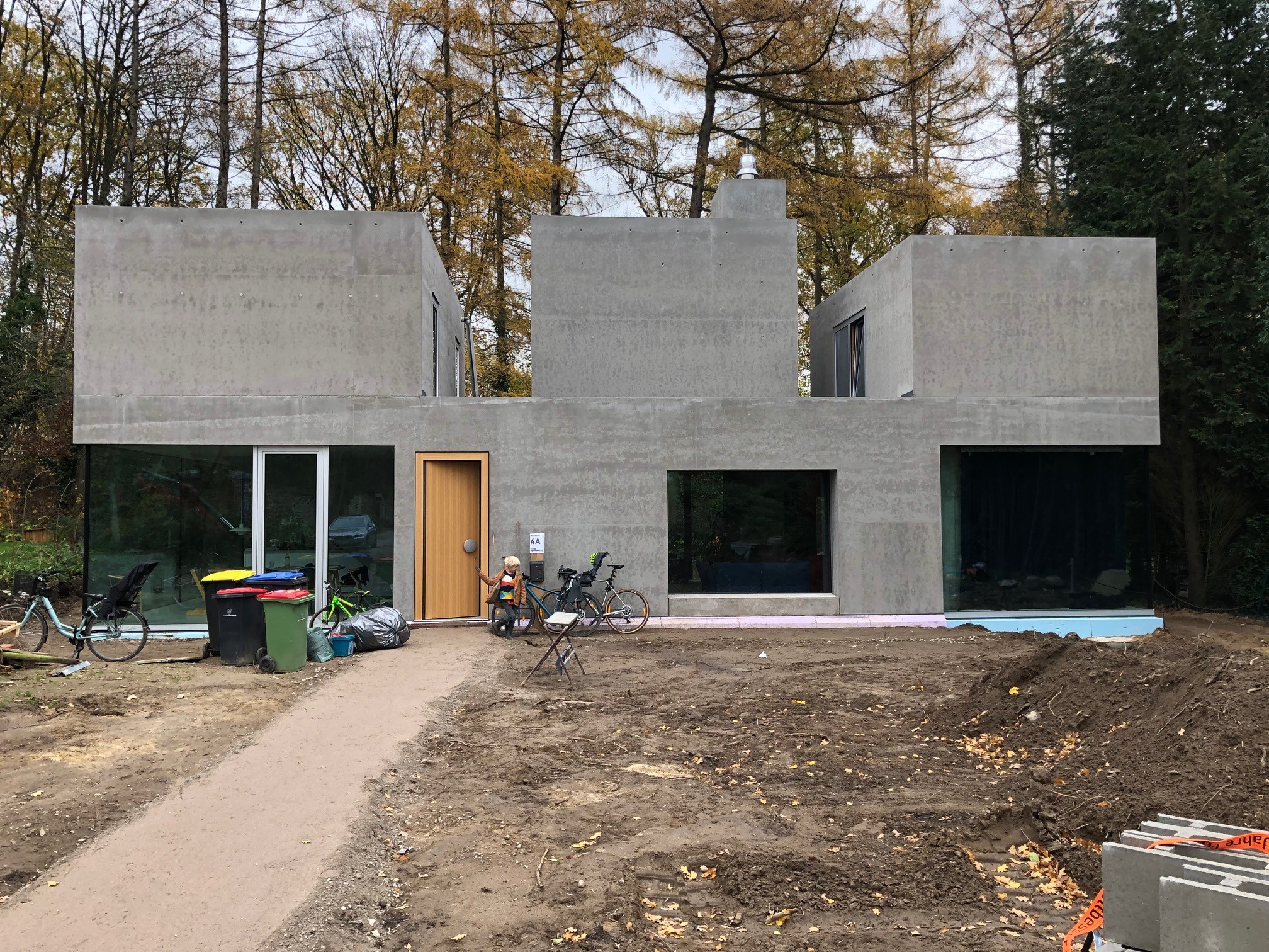 Hands working on a device or document, representing professional results delivered to clients.