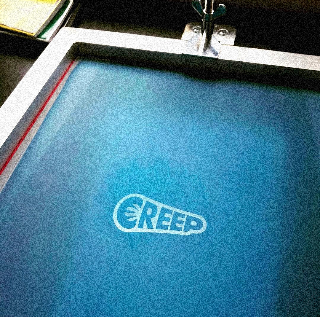 creep screenprint screen in blue.