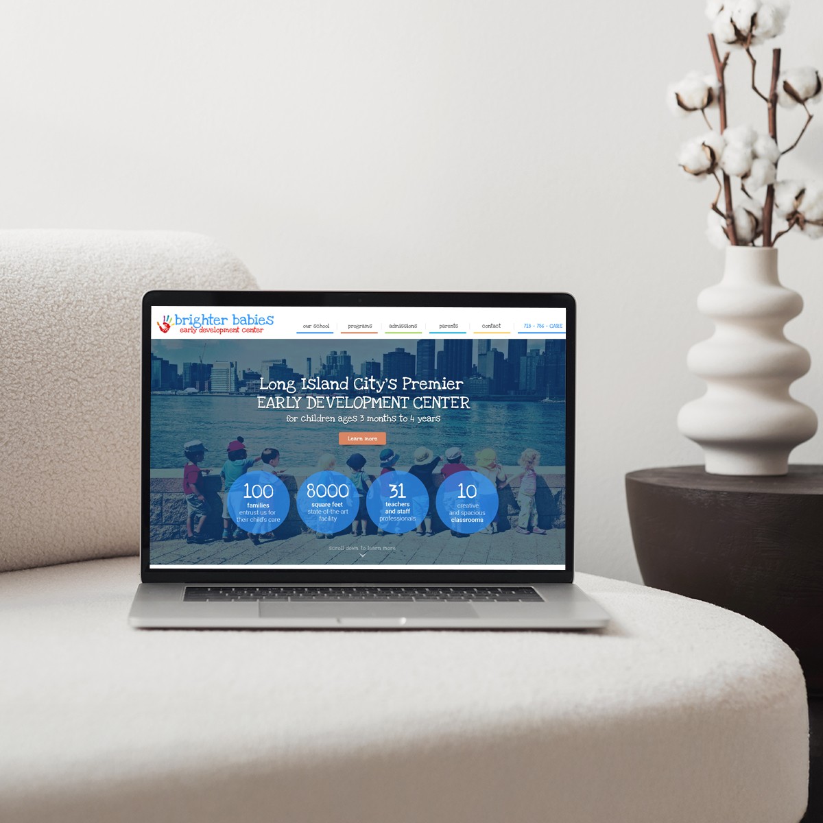Laptop displaying Brighter Babies Early Development Center website with Long Island City skyline background.