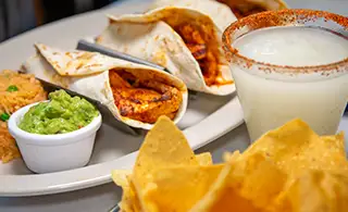 Rafa’s Cafe Tex-Mex appetizer platter with margarita