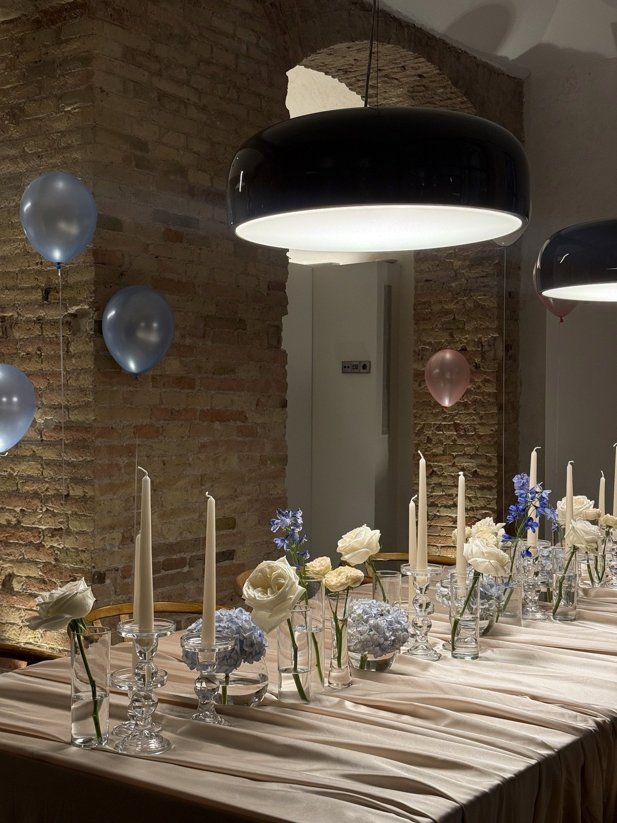 Table set with candles and balloons