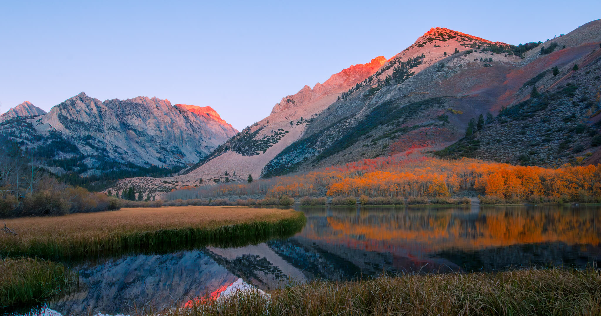 sunrise light on the tops of mountains