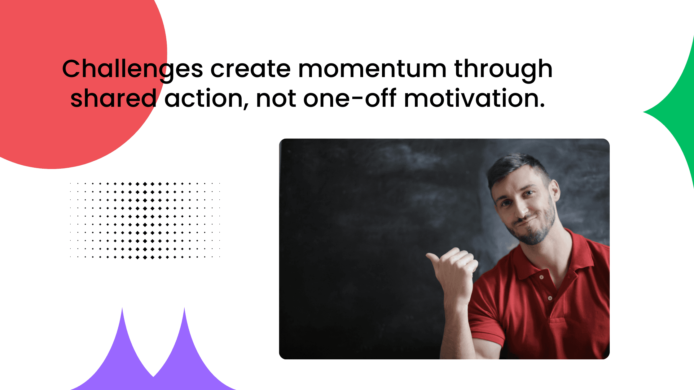 Man in a red shirt gesturing toward a blank chalkboard behind him.