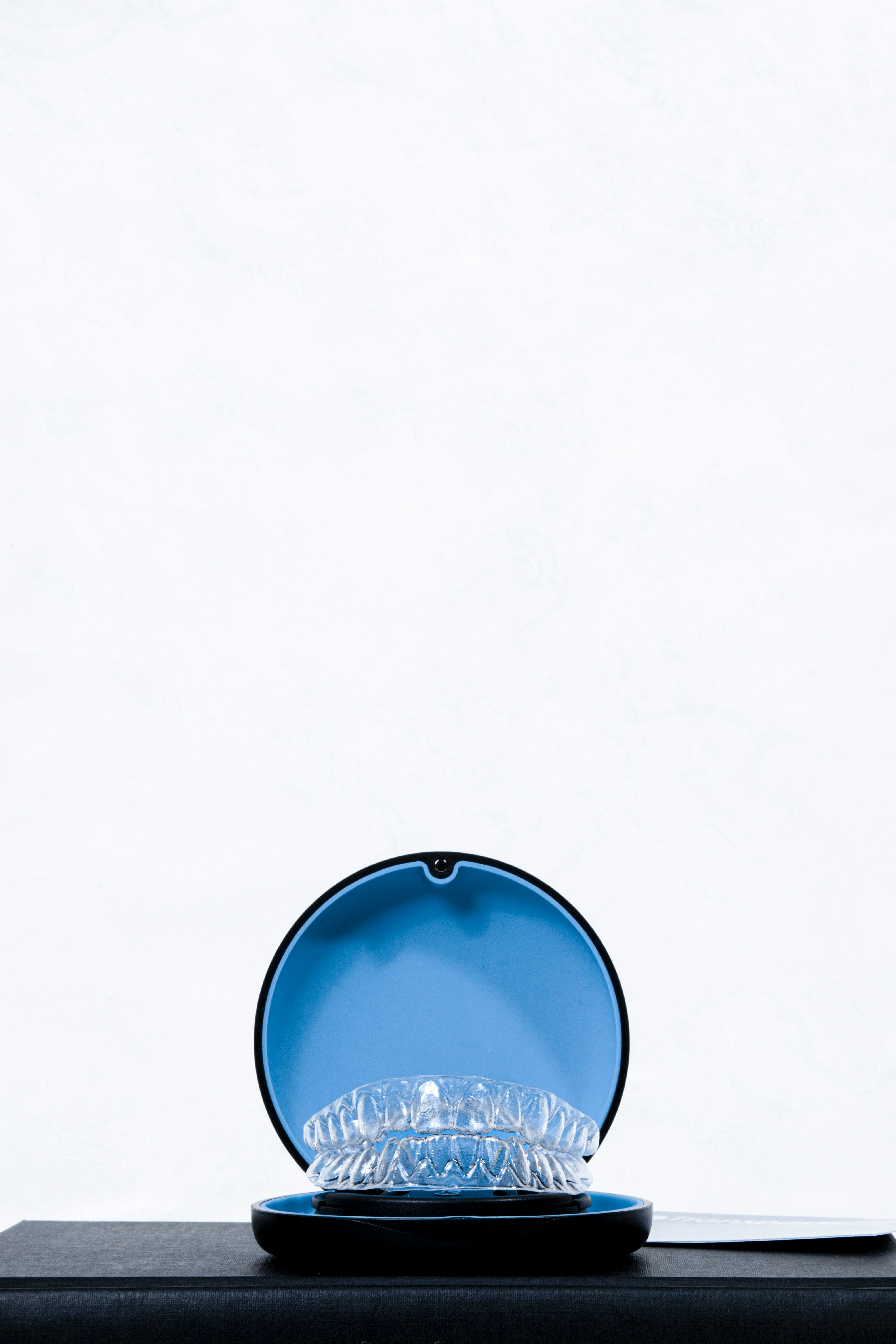 a blue bowl with a white background