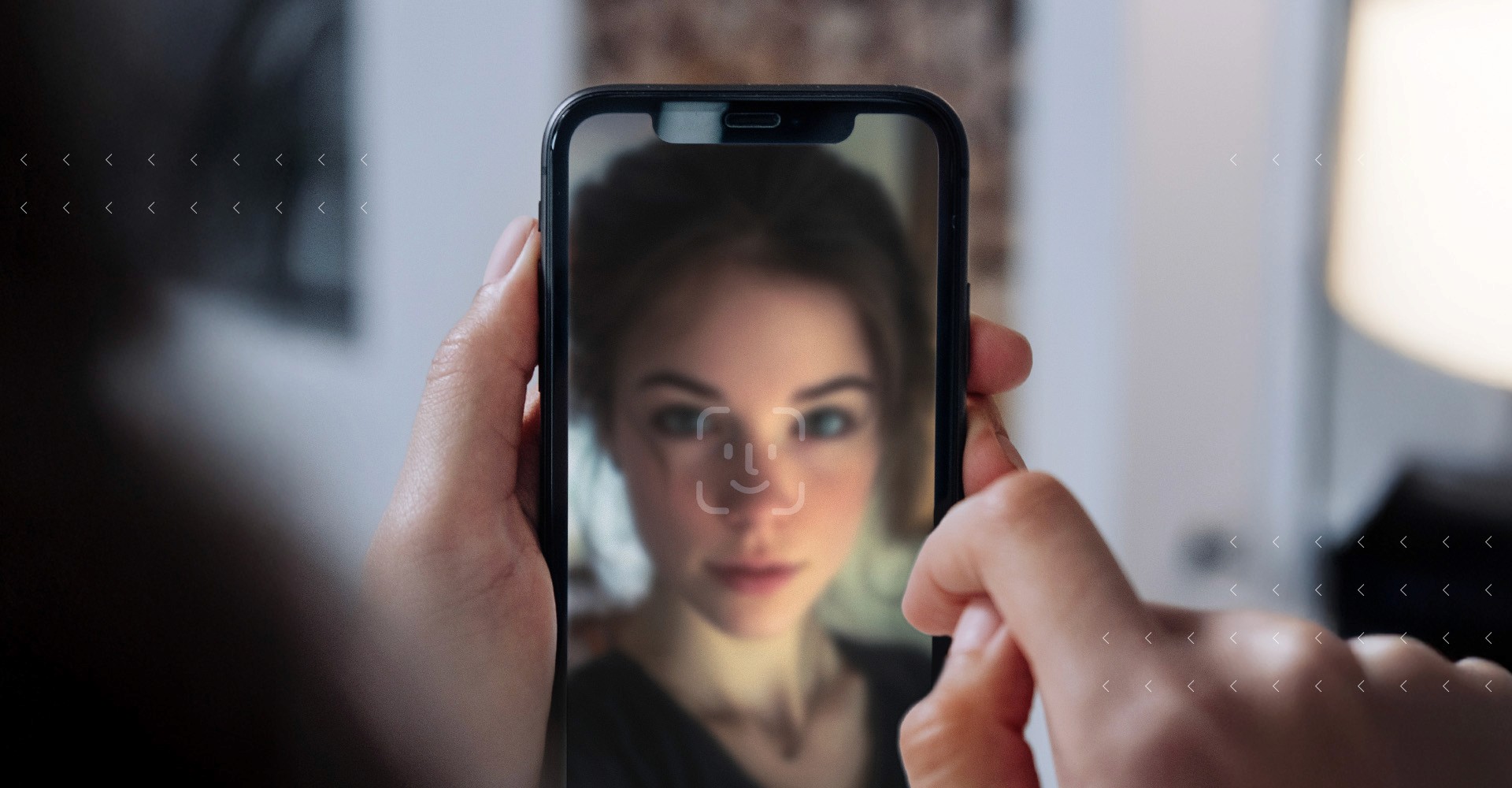 Women using face ID on a mobile phone