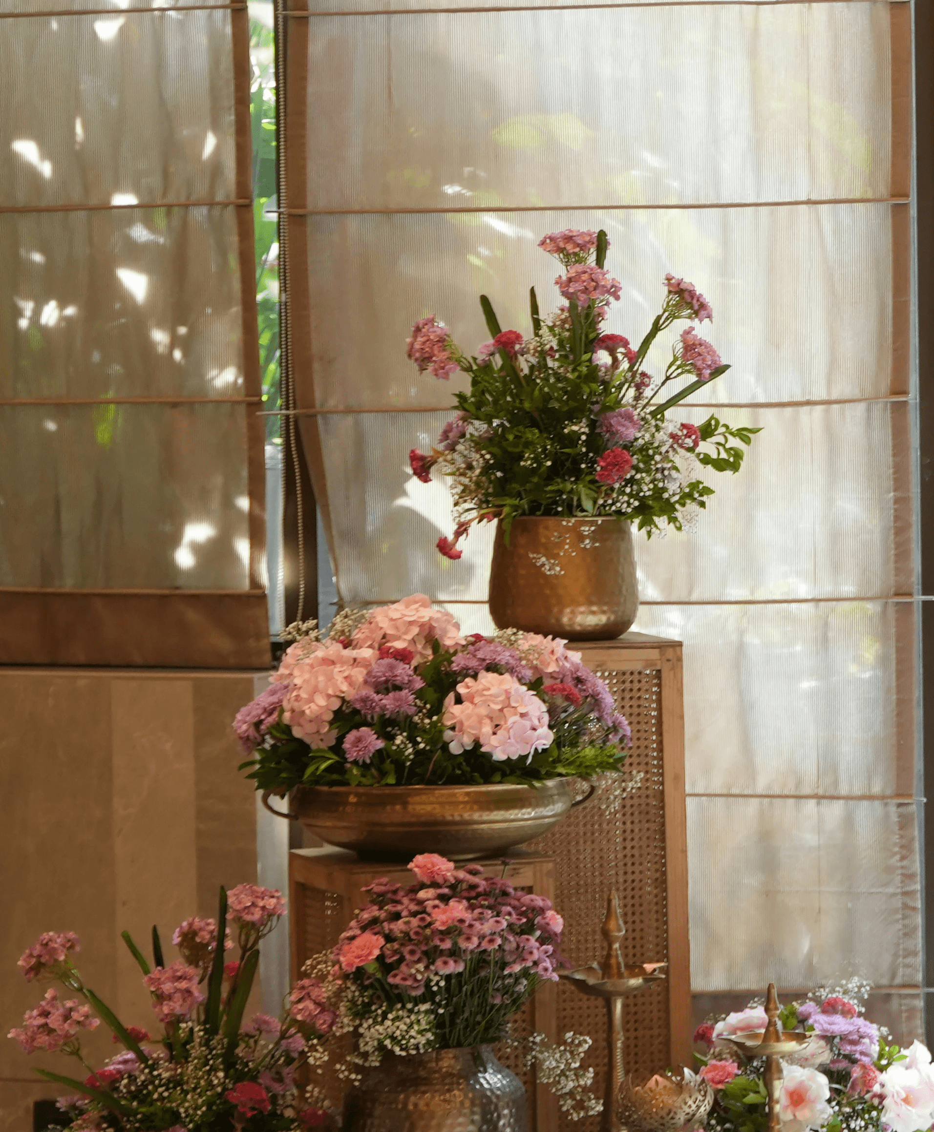 A couple embraces lovingly on a wooden dock.