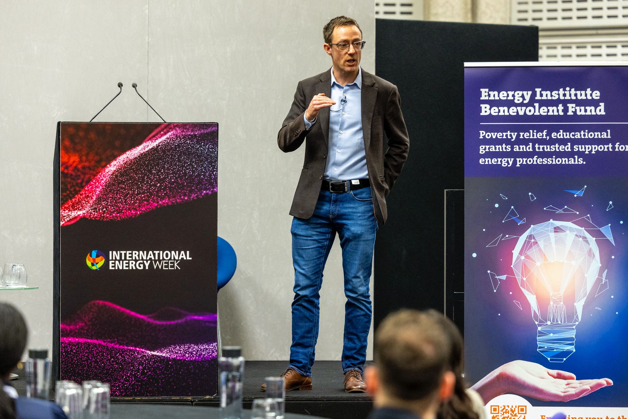 Yorik Tisseau delivering a keynote at International Energy Week titled "We Turn Technical Experts into Operational Authorities," focusing on the intersection of strategy and project execution.