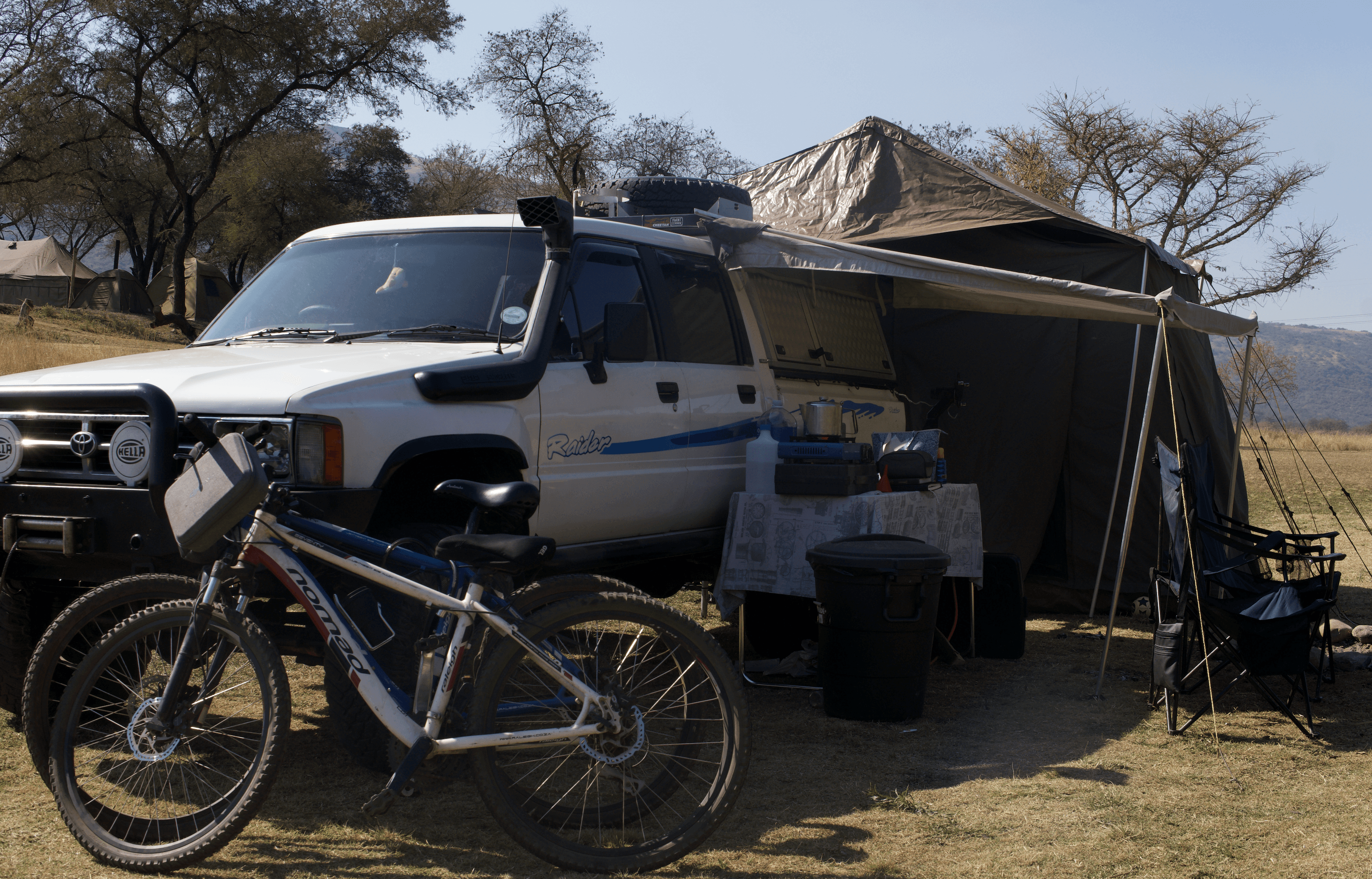two people looking at a tablet and smiling