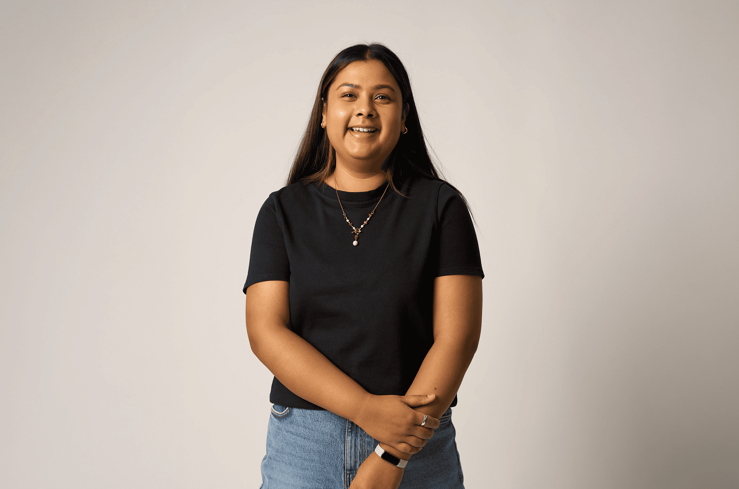 modern building by the road with cars driving by