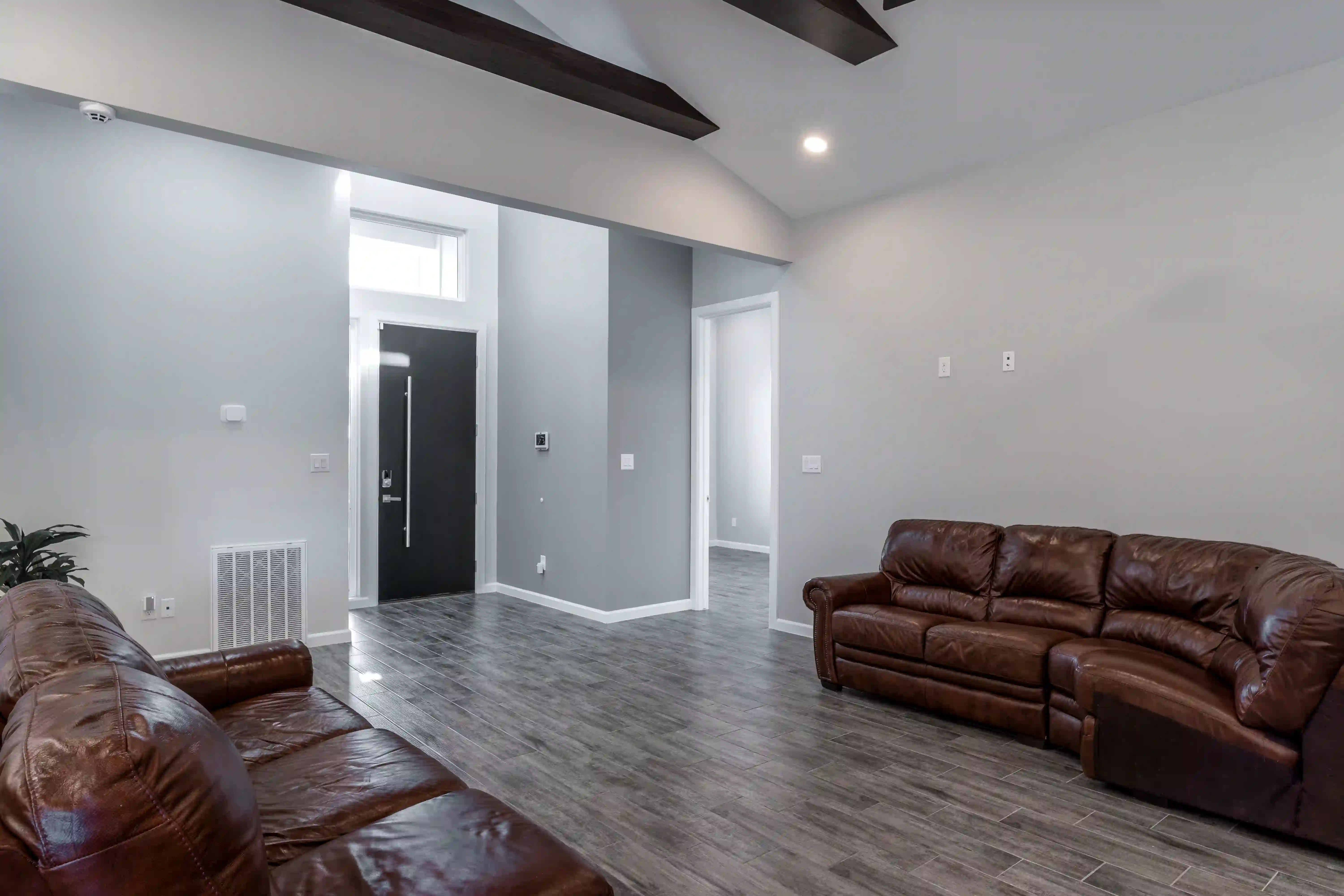 A picture of a house during twilight.