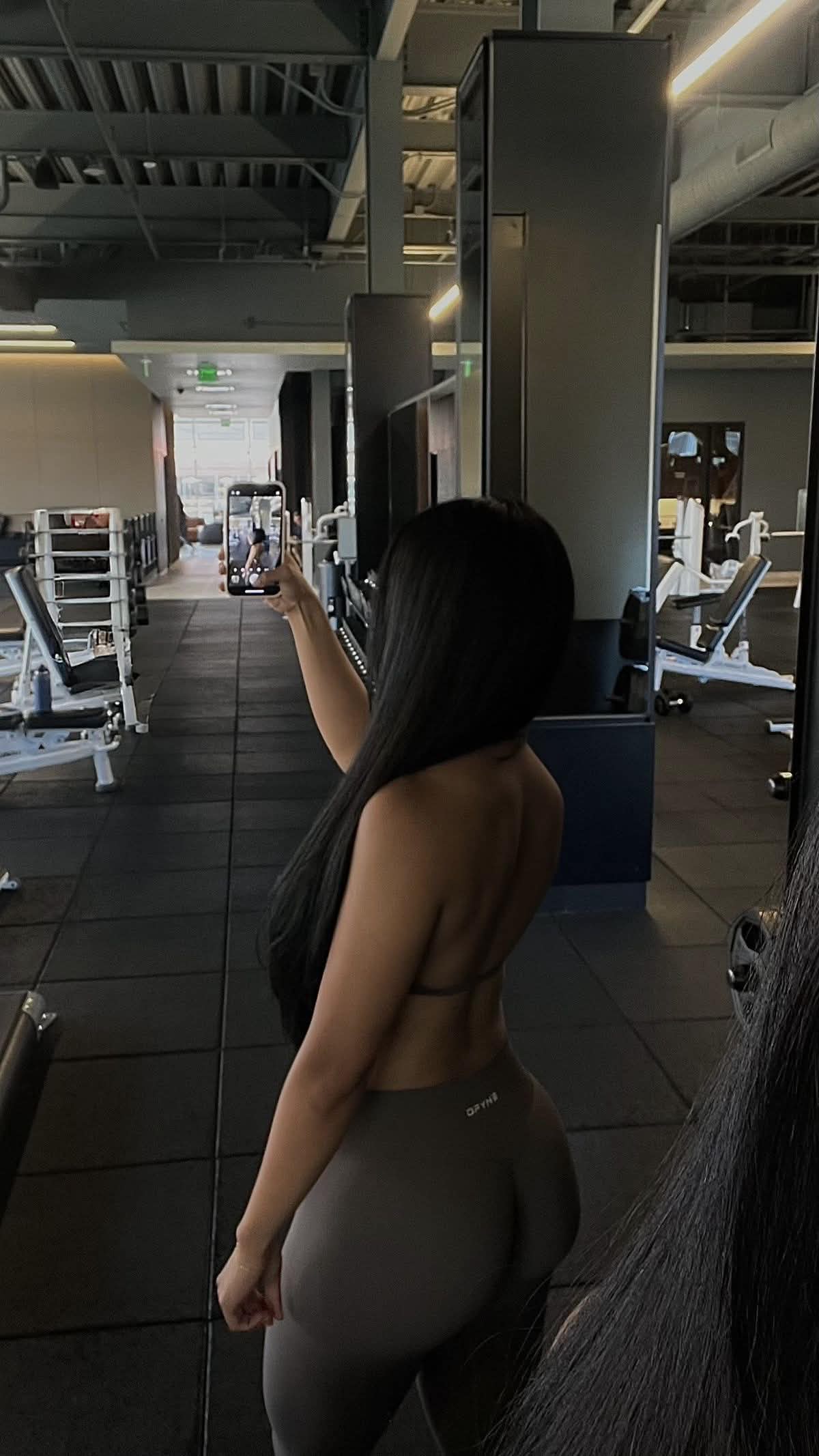 a man with a goatee smiles at the camera