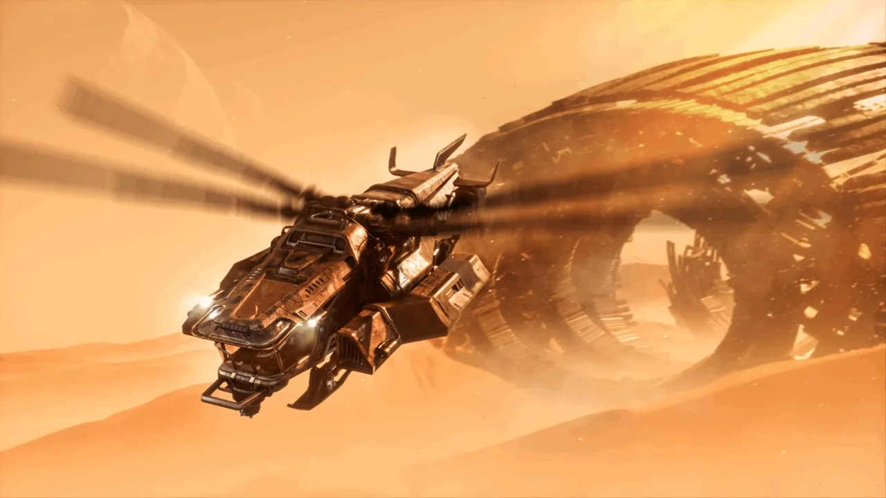 A futuristic, metallic spacecraft with spinning rotor blades soars in front of a massive, partially buried circular structure on a dusty, alien desert landscape at sunset.