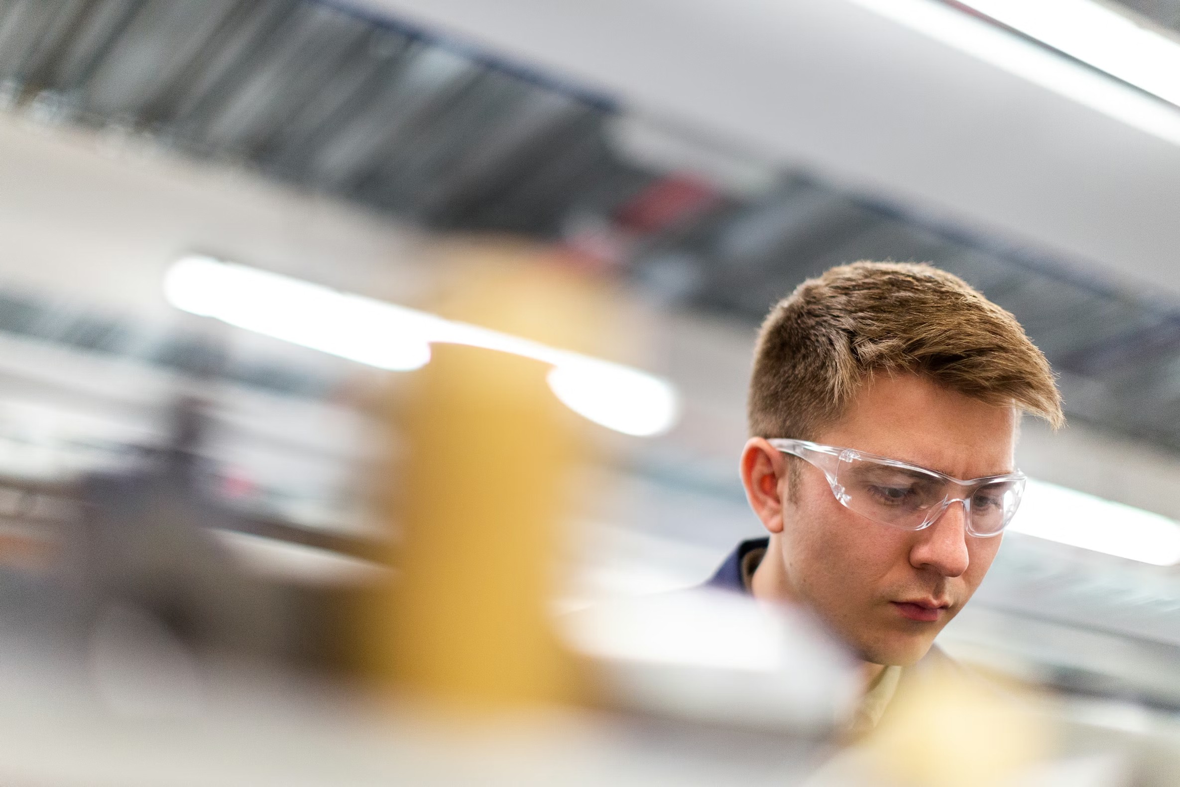 Genesis Polymers team member in a professional setting