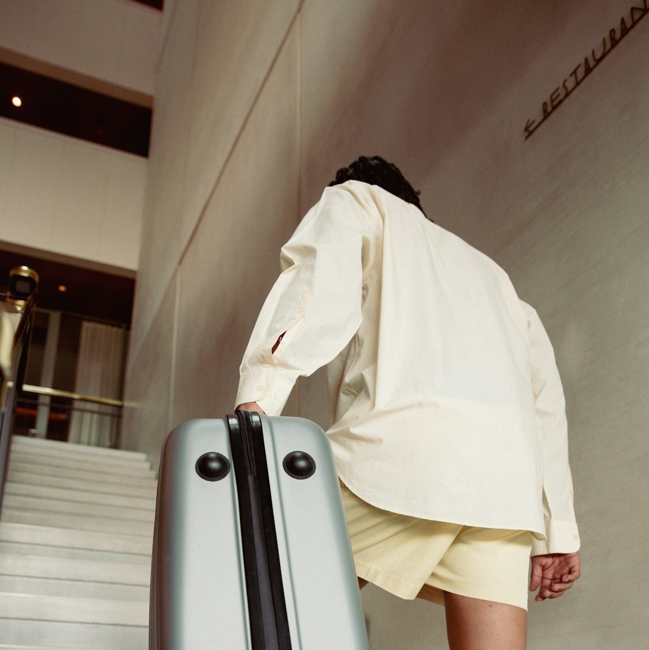 Woman looking out plane window