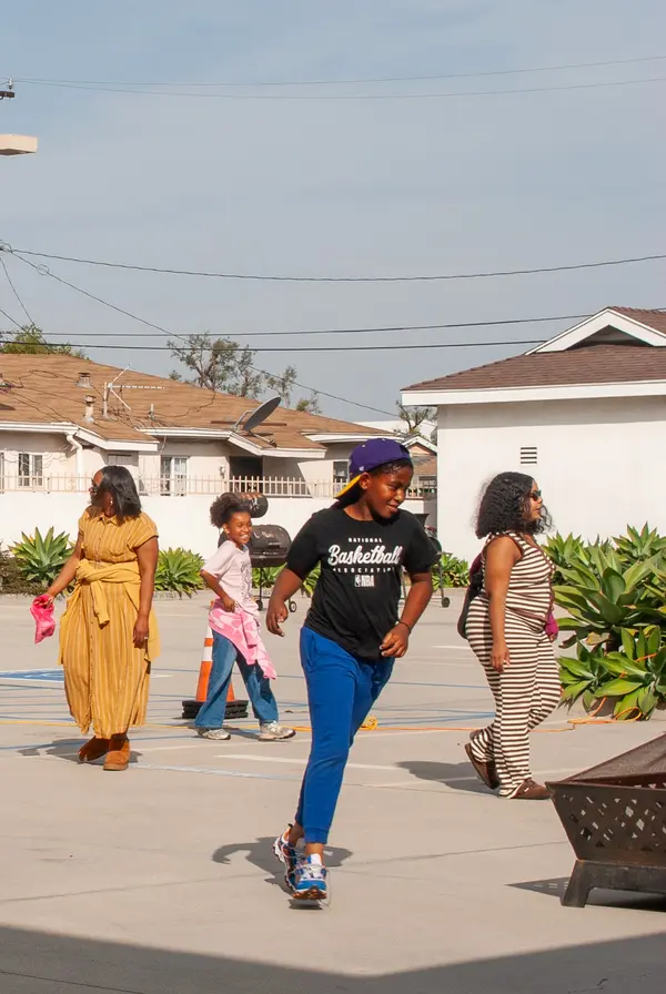 Church members and families participating in outdoor fellowship activities