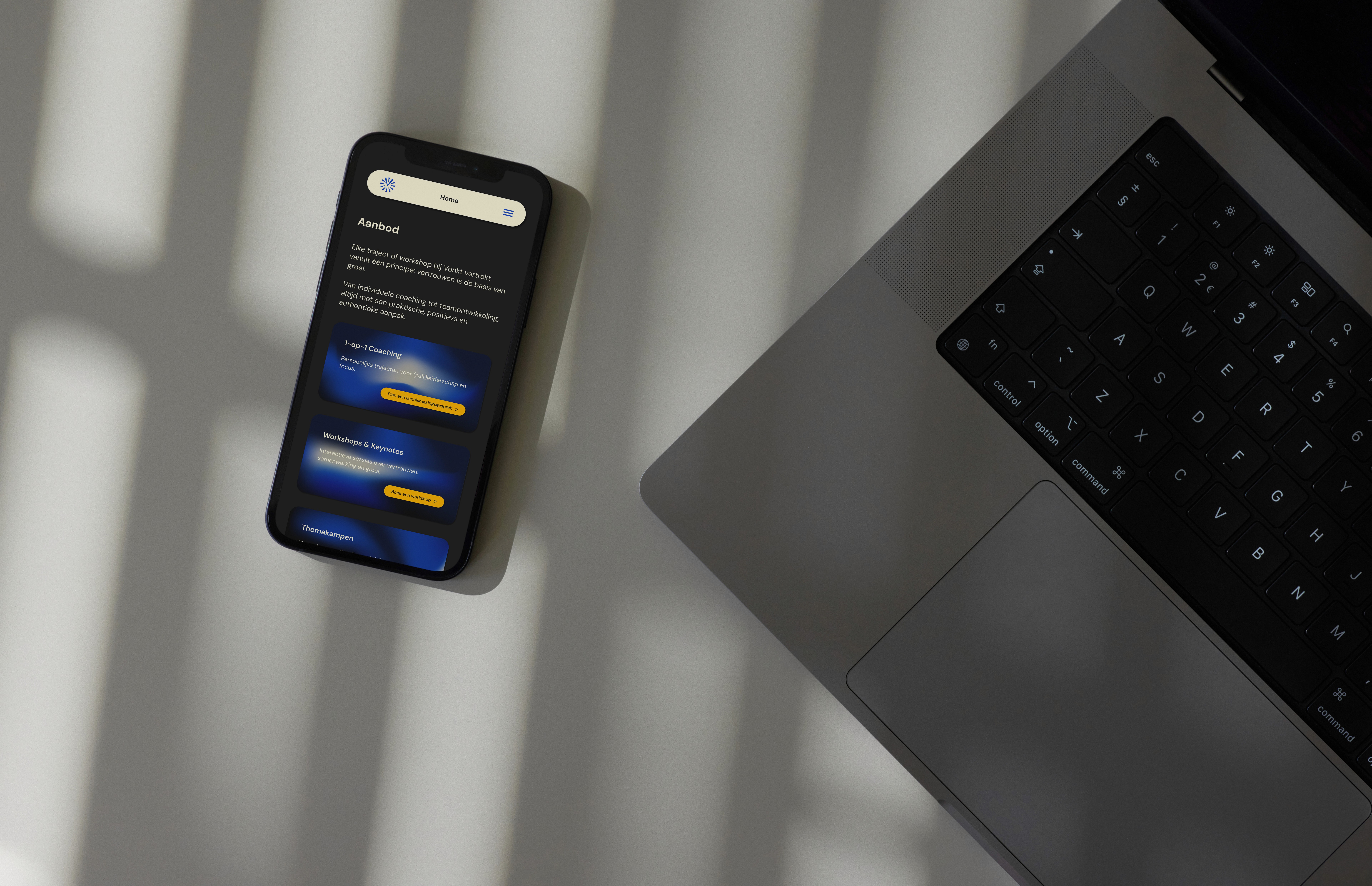 Branded website on a smartphone for business coaching brand Vonkt