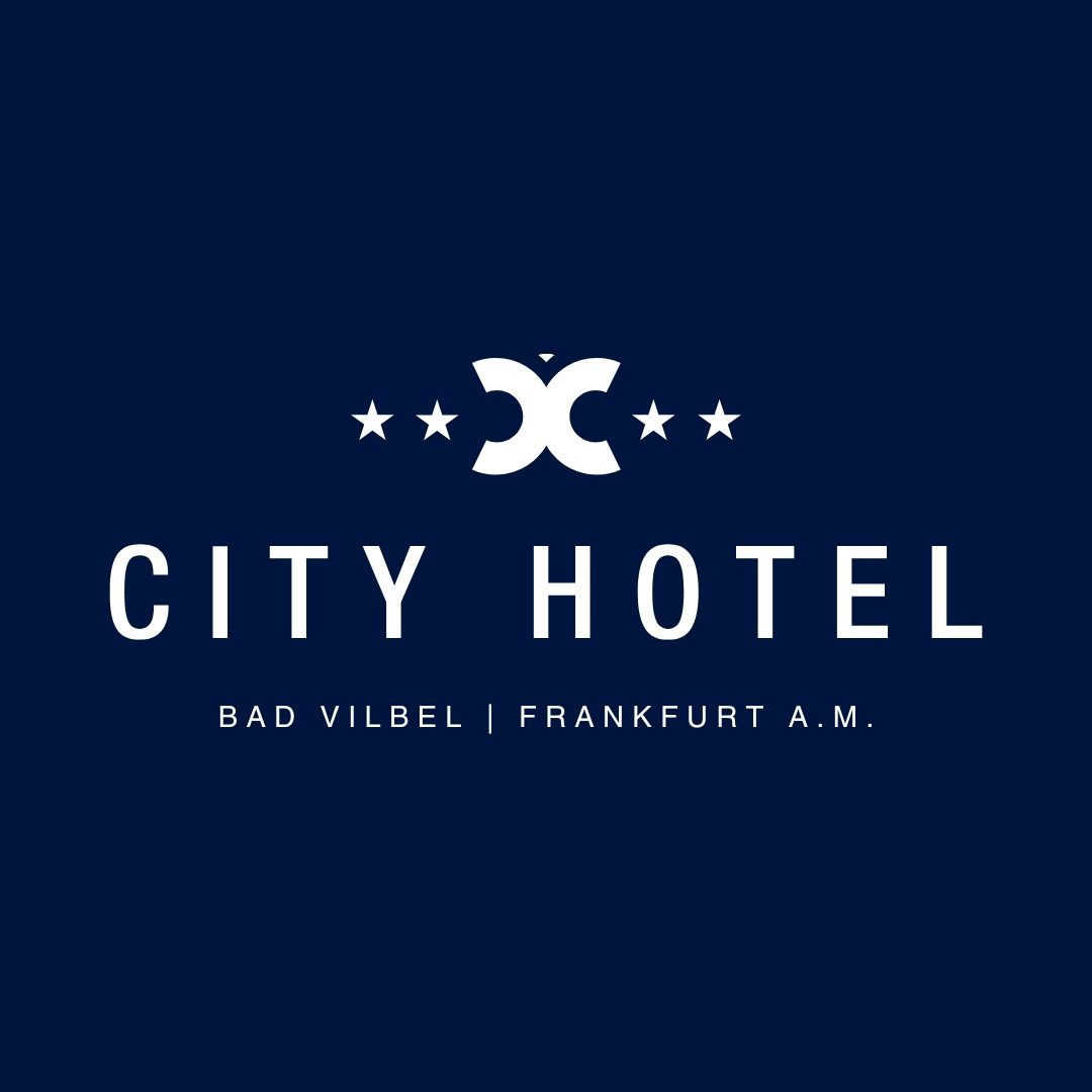 Macro shot of shallow seawater over smooth pebbles, sunlight refracting through the clear turquoise surface. 