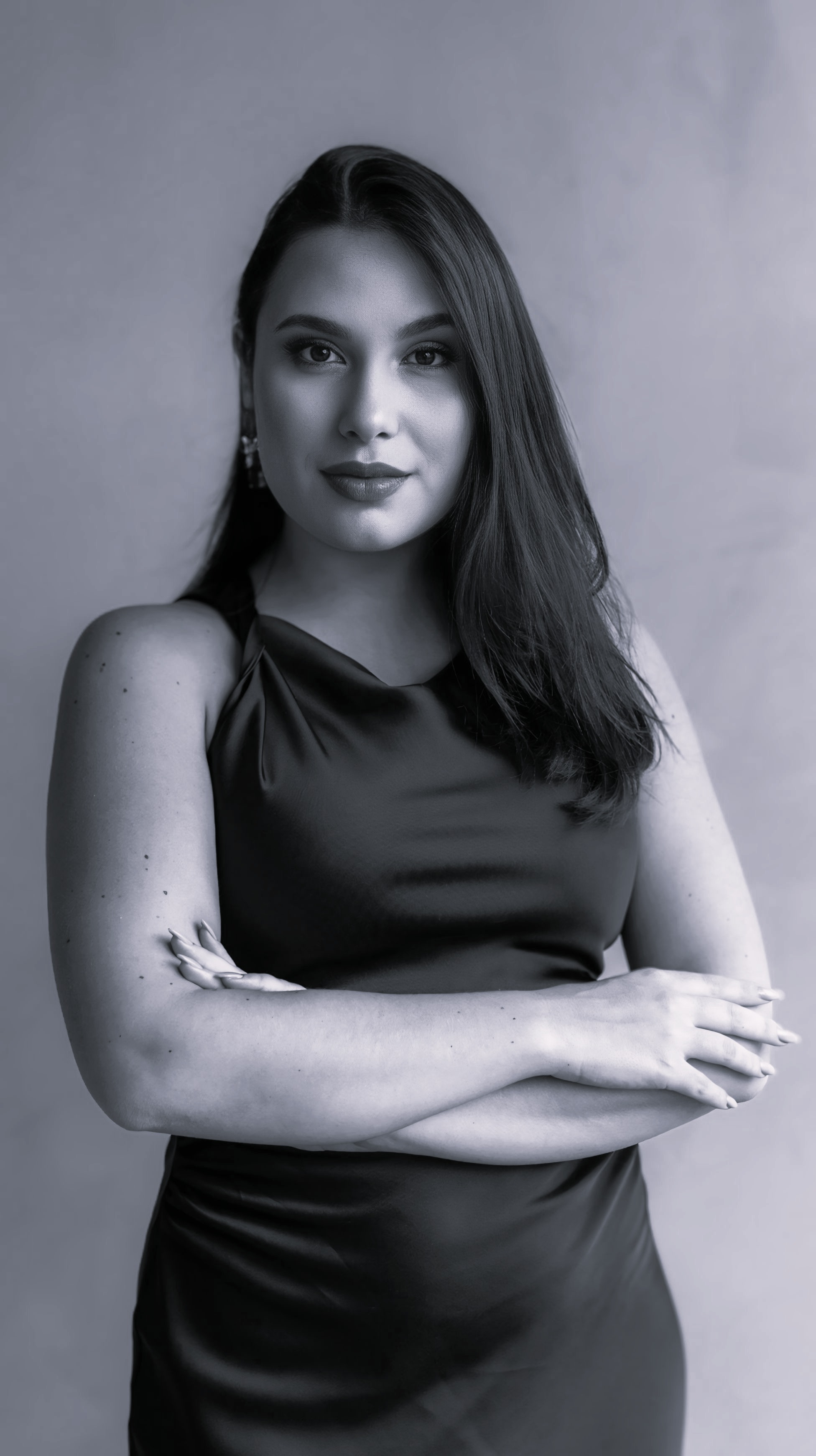 person sitting in a chair in front of a man