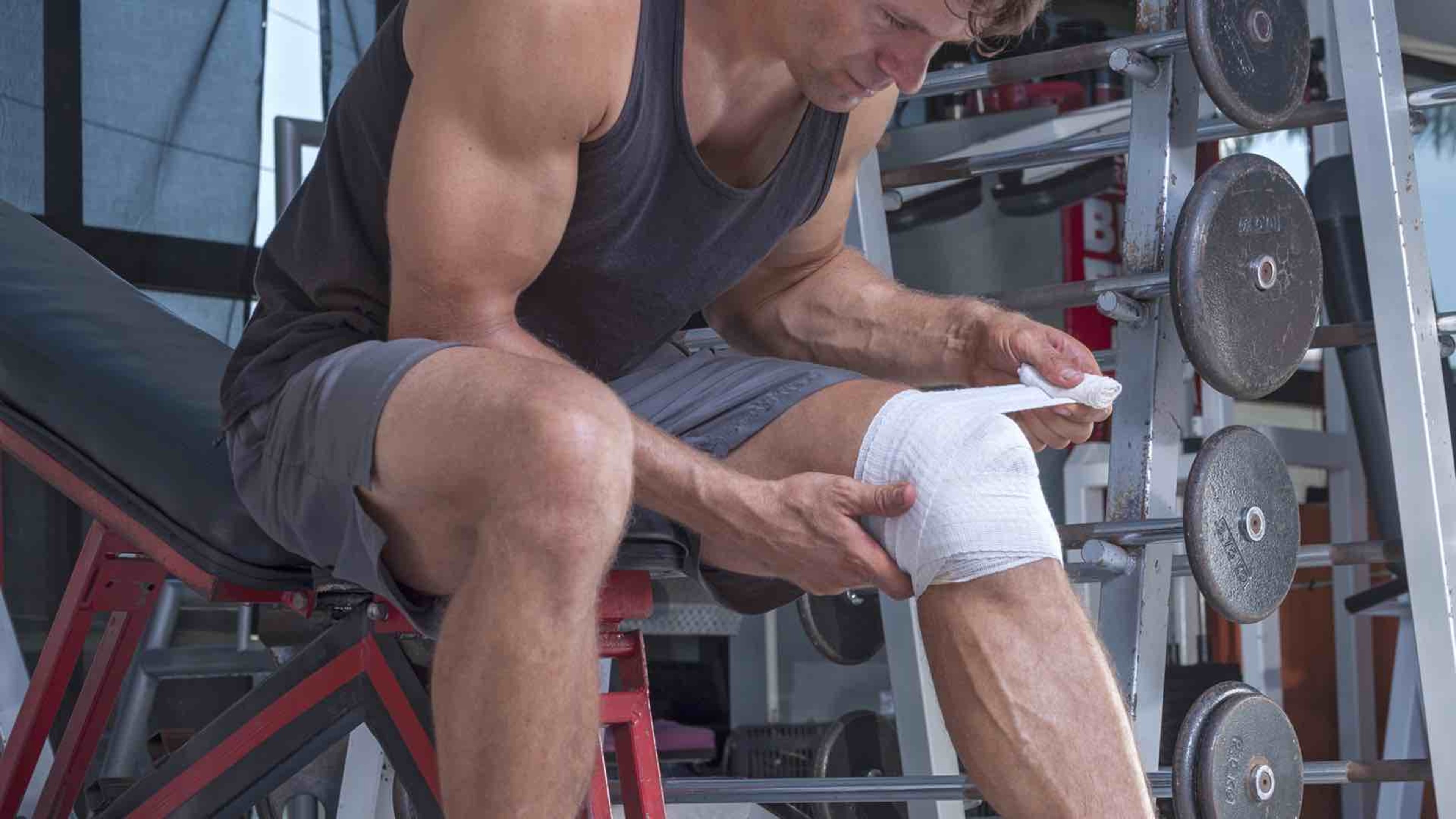 putting bandage on knee