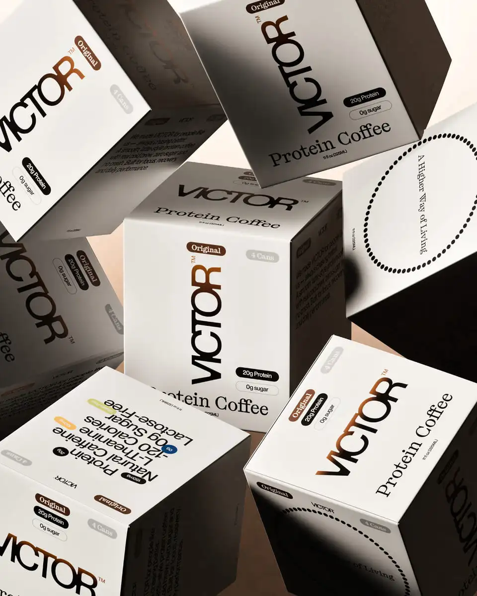 A hand holding a phone in which appears a can of coffe from VICTOR's project.