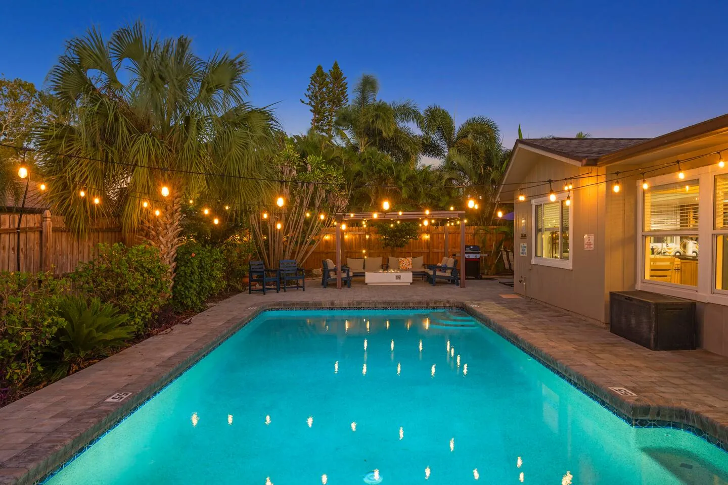 Pool at twilight from the patio at Sarasota Beach Bungalow, Bradenton, Florida