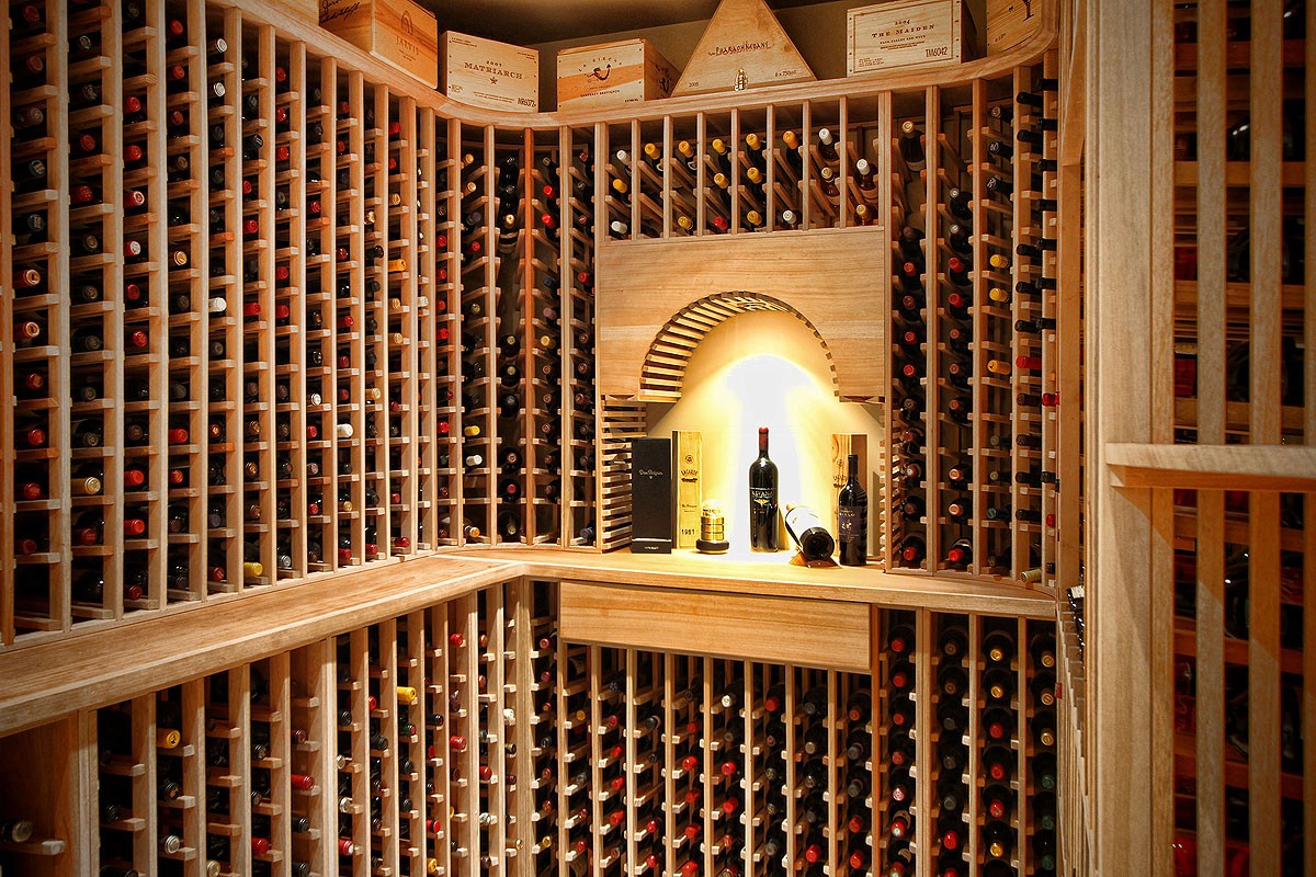 Another interior shot of the wine cellar, showcasing its sleek design and wine storage arrangement.