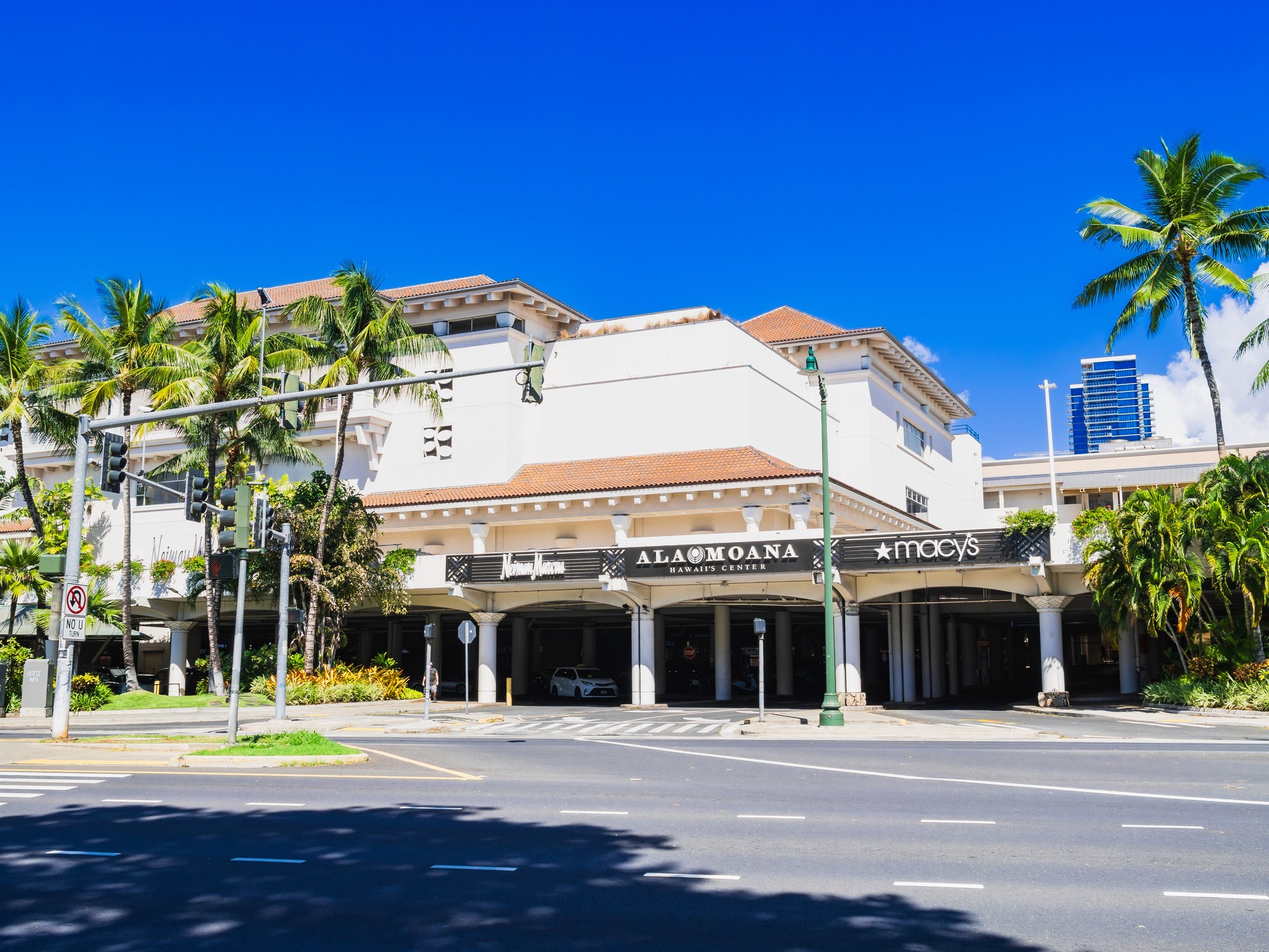 brown wooden beach lounge chair on beach during daytime